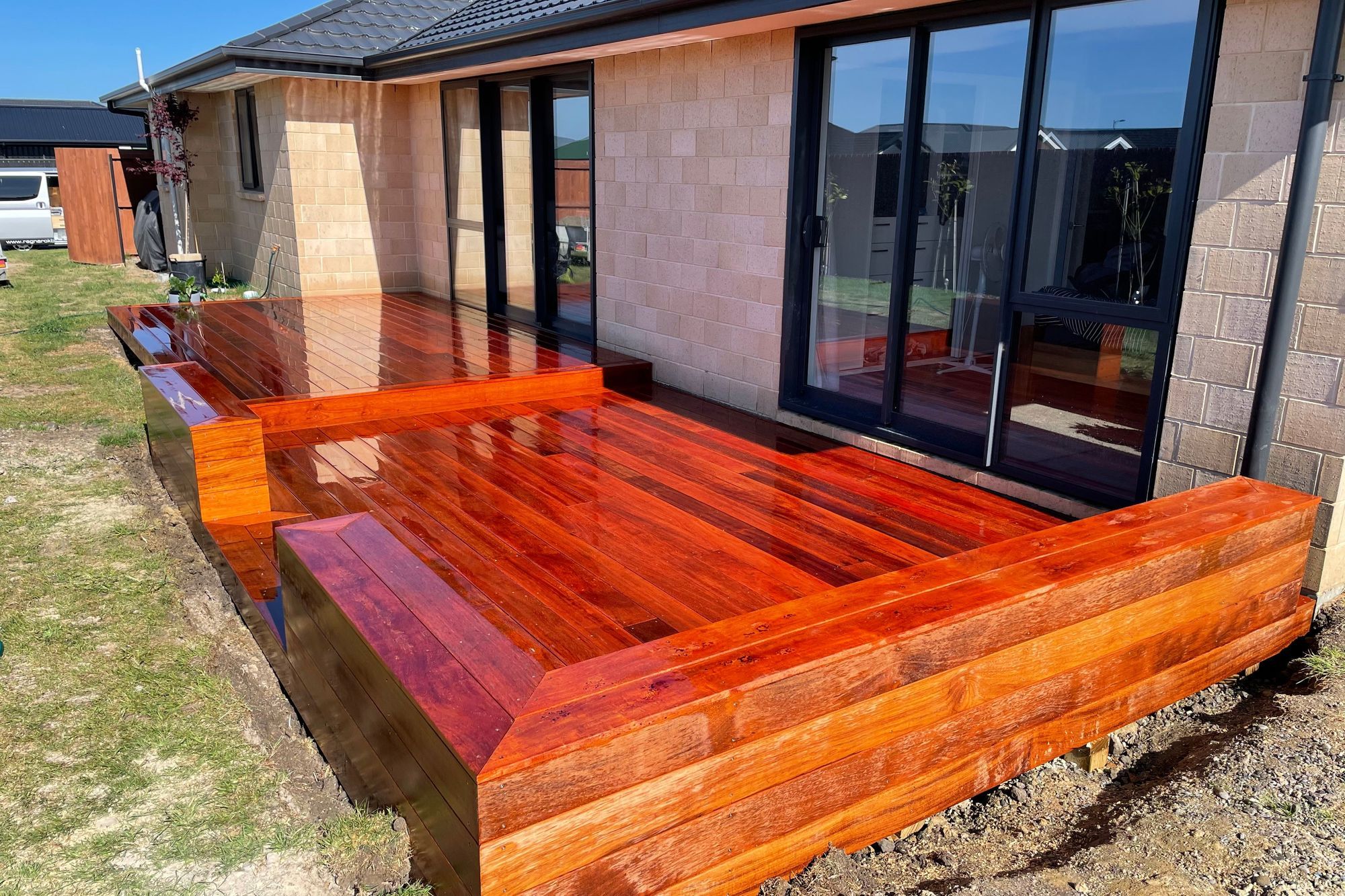 Washed down, freshly finished kwila deck