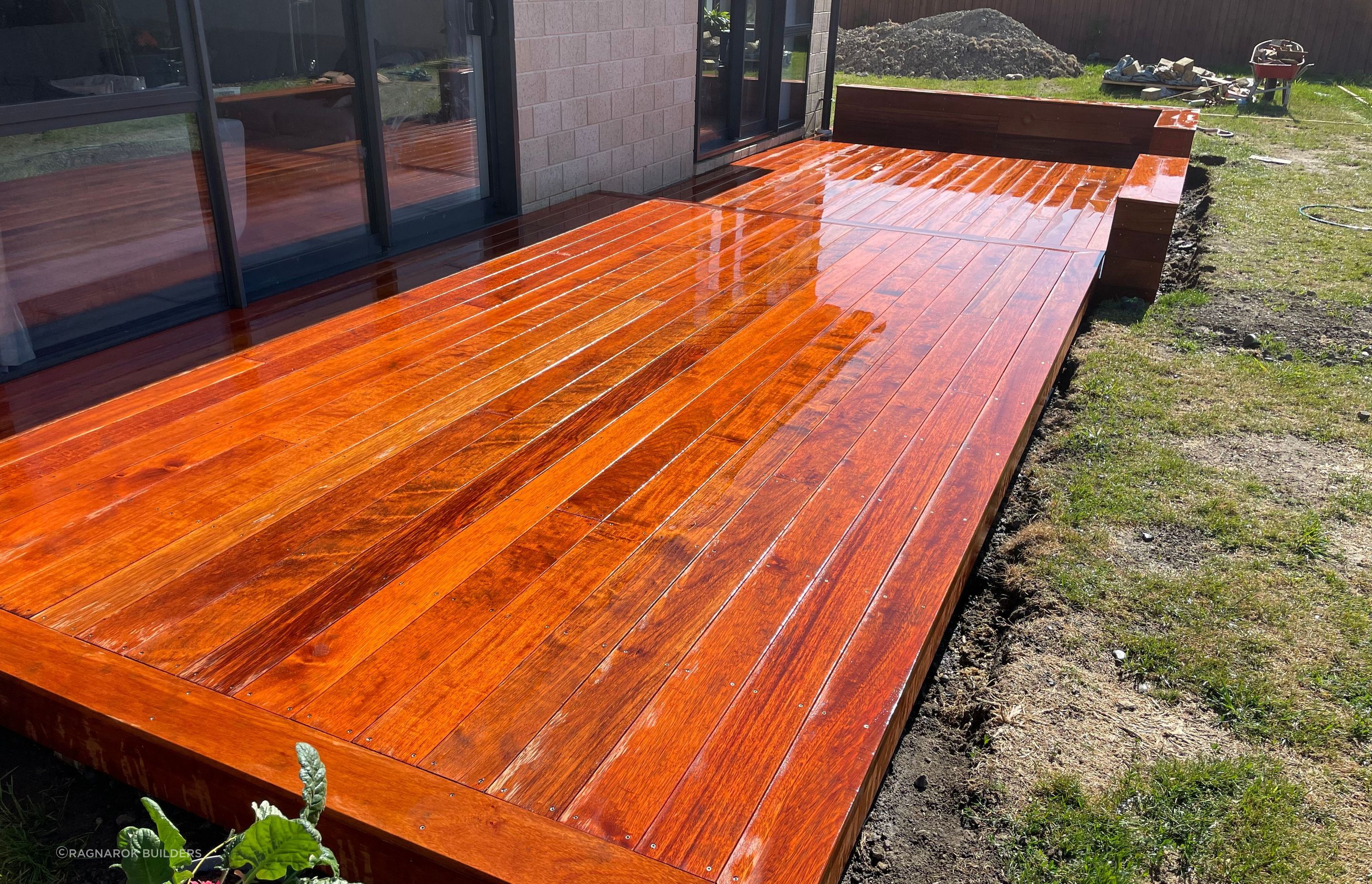 Completed kwila deck with step down and raised seating.