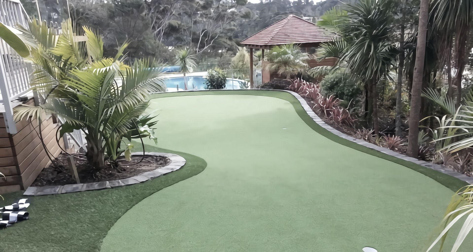 Turn your lawn into your own care-free golf green banner