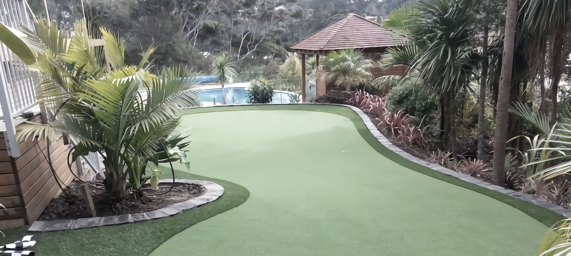 Turn your lawn into your own care-free golf green banner