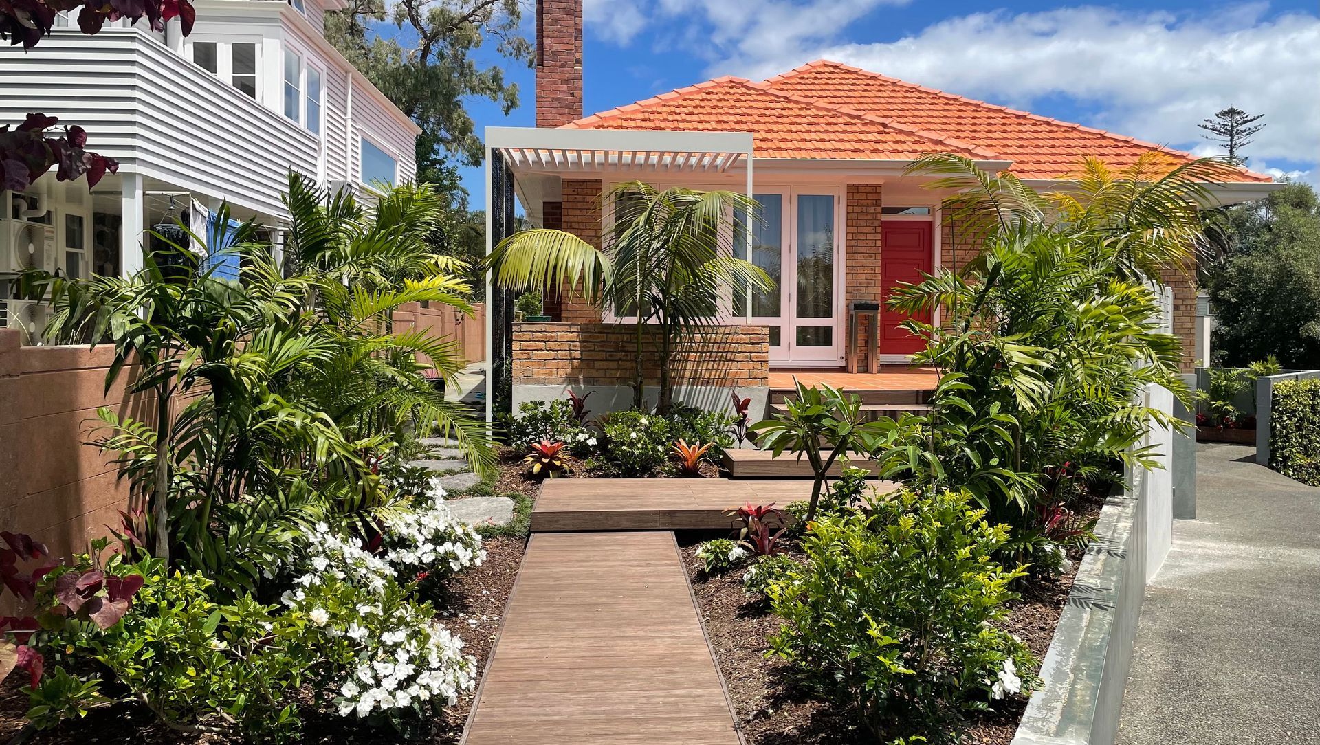 New entry decks, garden and paths