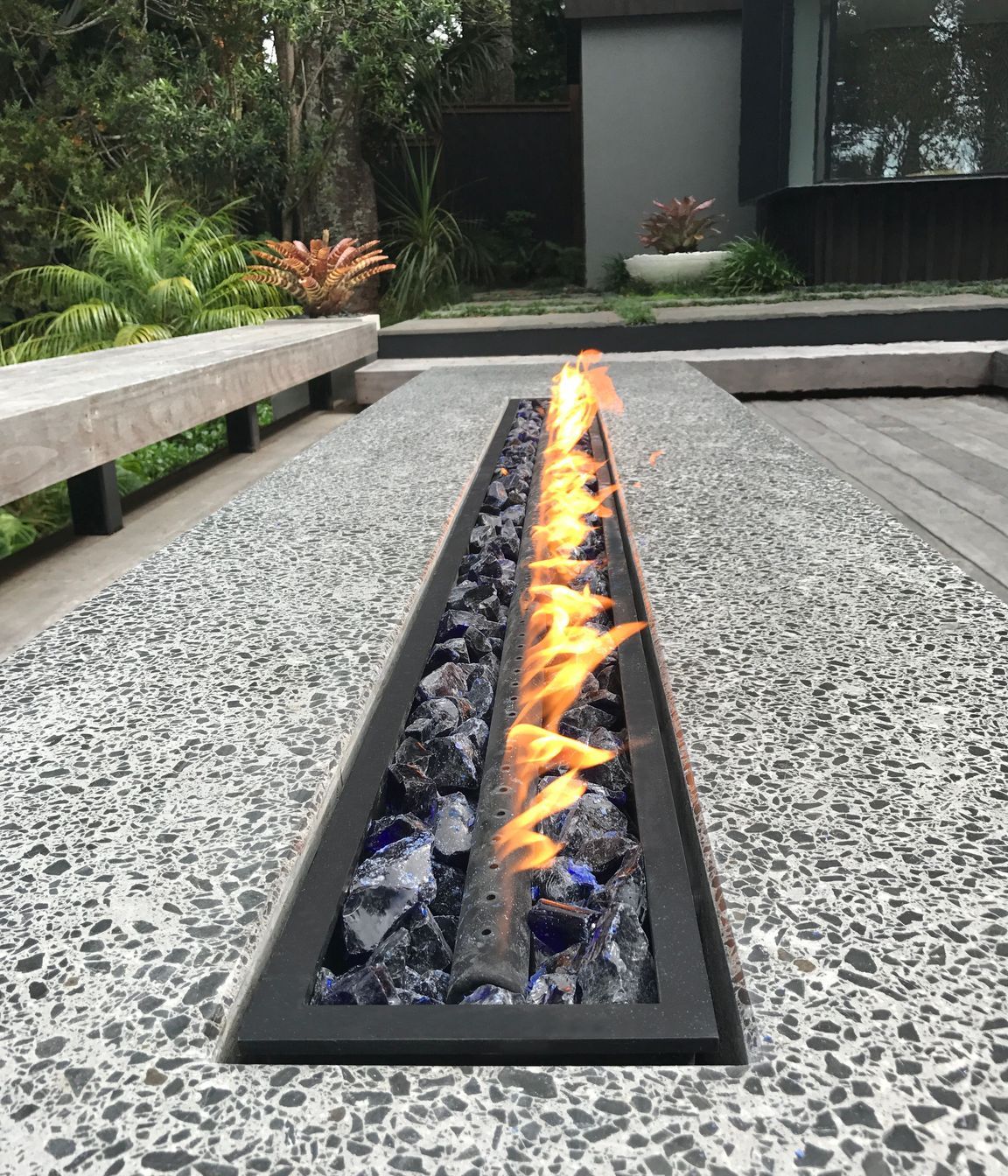 Fire pit table. Designed by lanzscapes