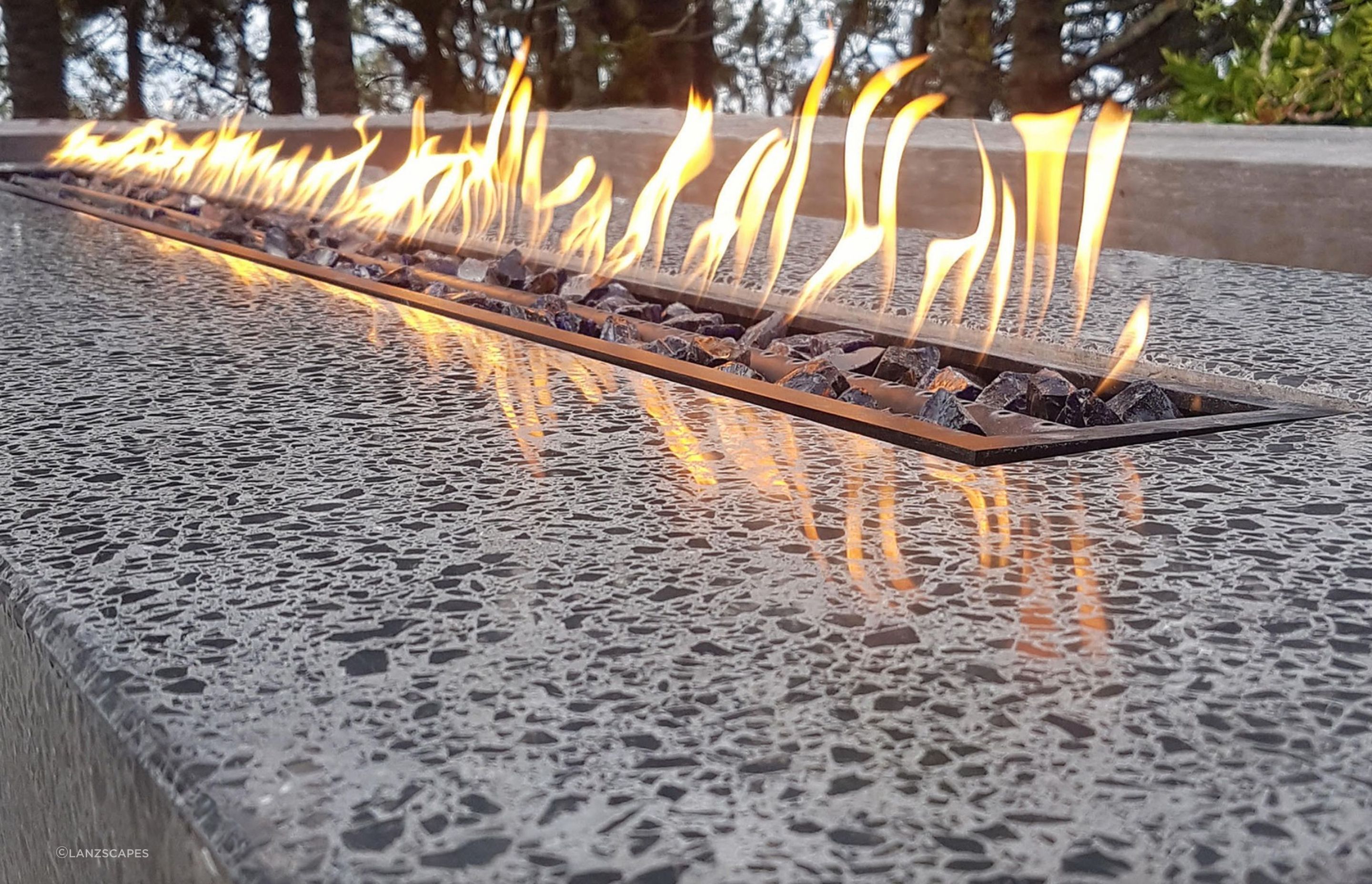 Fire pit table. Designed by Lanzscapes