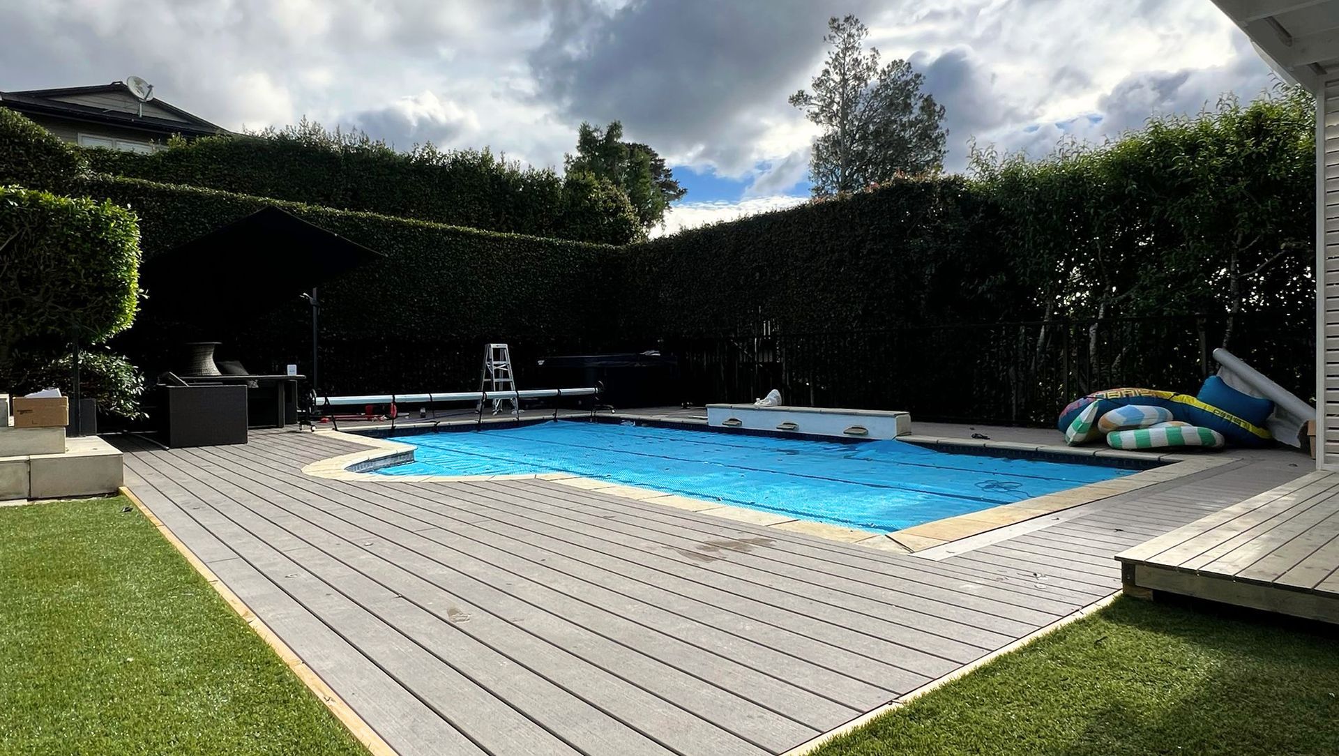 Pool deck with home office cabin banner