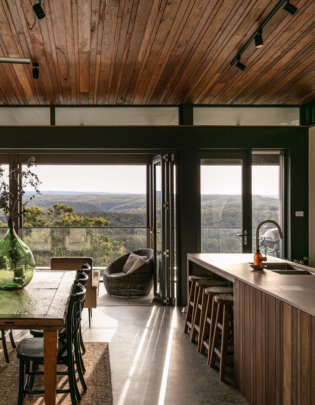 The blue mountain horizon is a contant feature in this house as it draws you outside and calms your spirit.