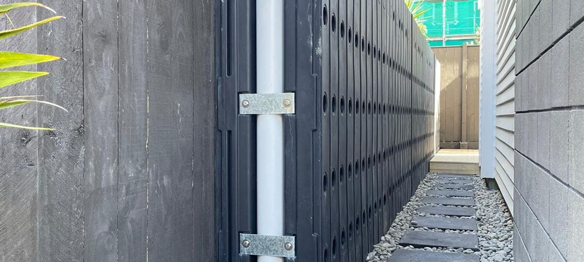 Fencetank fits along the fenceline saving space in a visually pleasing way.