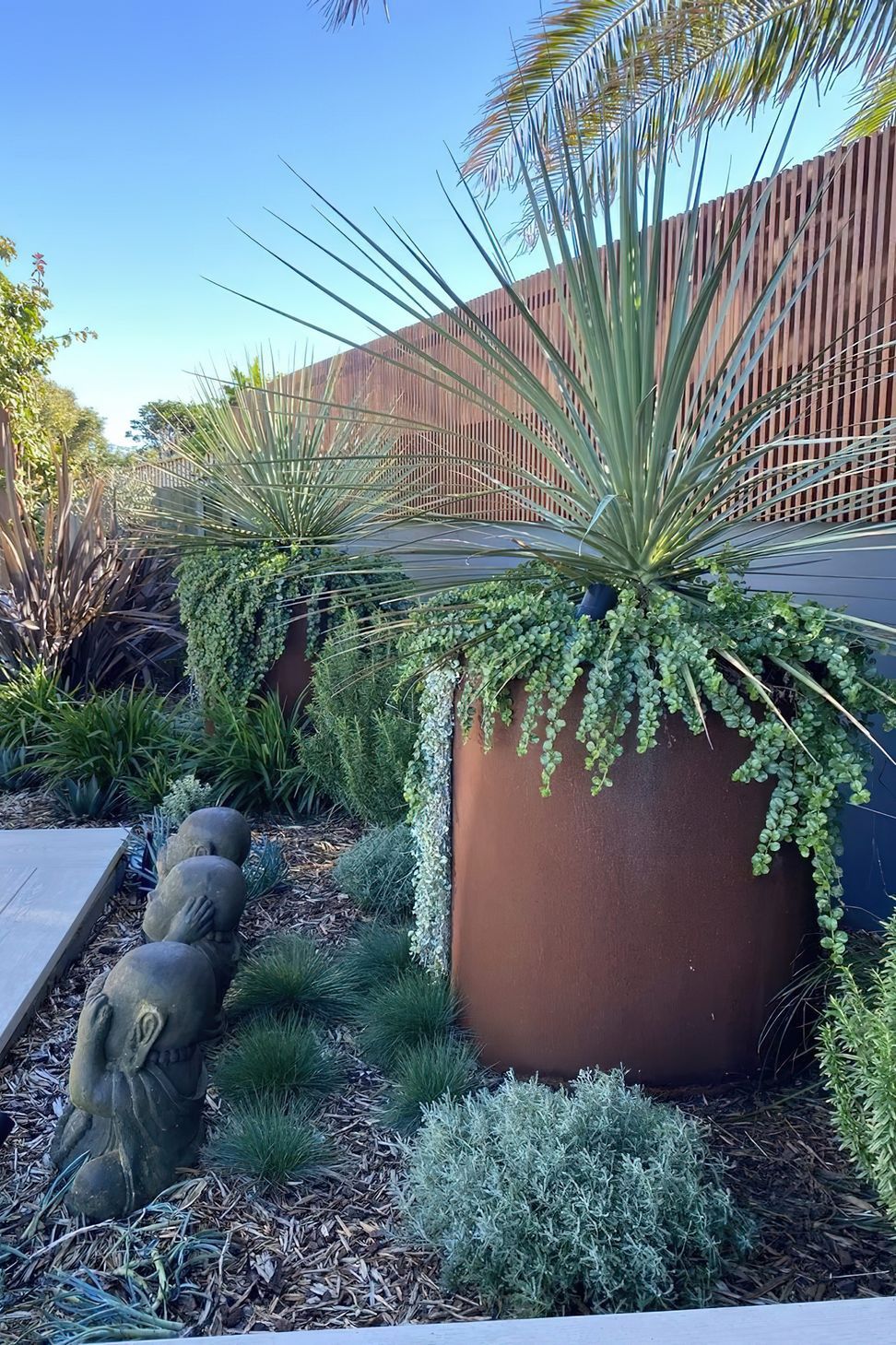 imgi18Coastal-pots-and-plants-Dover-Heights-Vogue-and-Vine-garden-designers-Sydney-NSW-1152x1536.jpeg