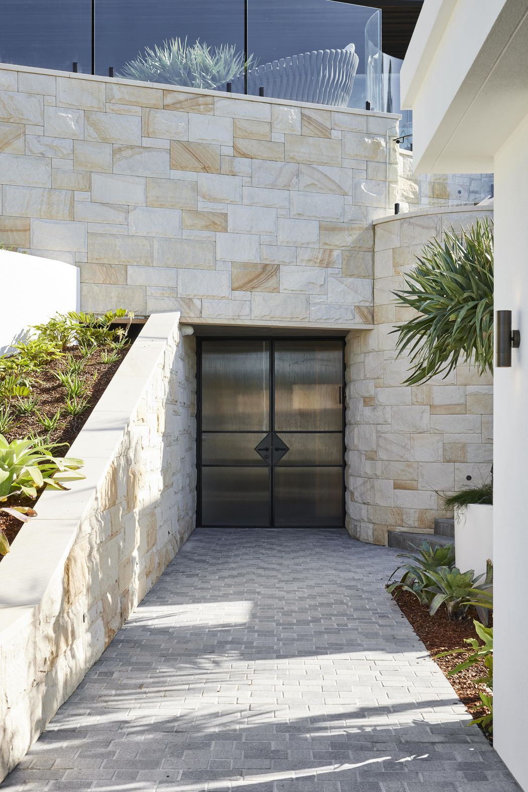Two-Tone Porphyry Cobblestones | EB Interiors | Innovate Architects | Ben Richardson Building