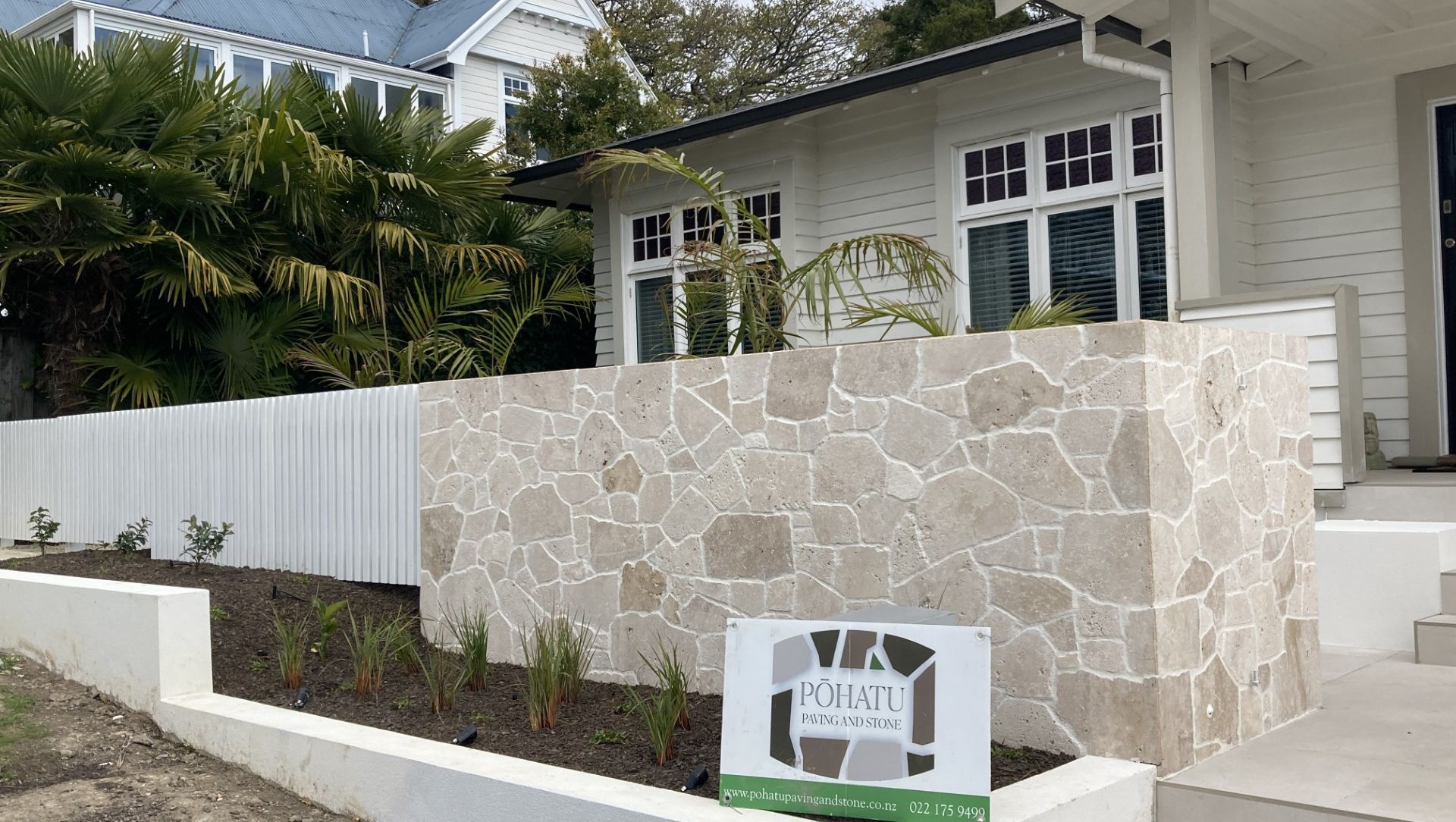 Freeform Travertine Entrance banner