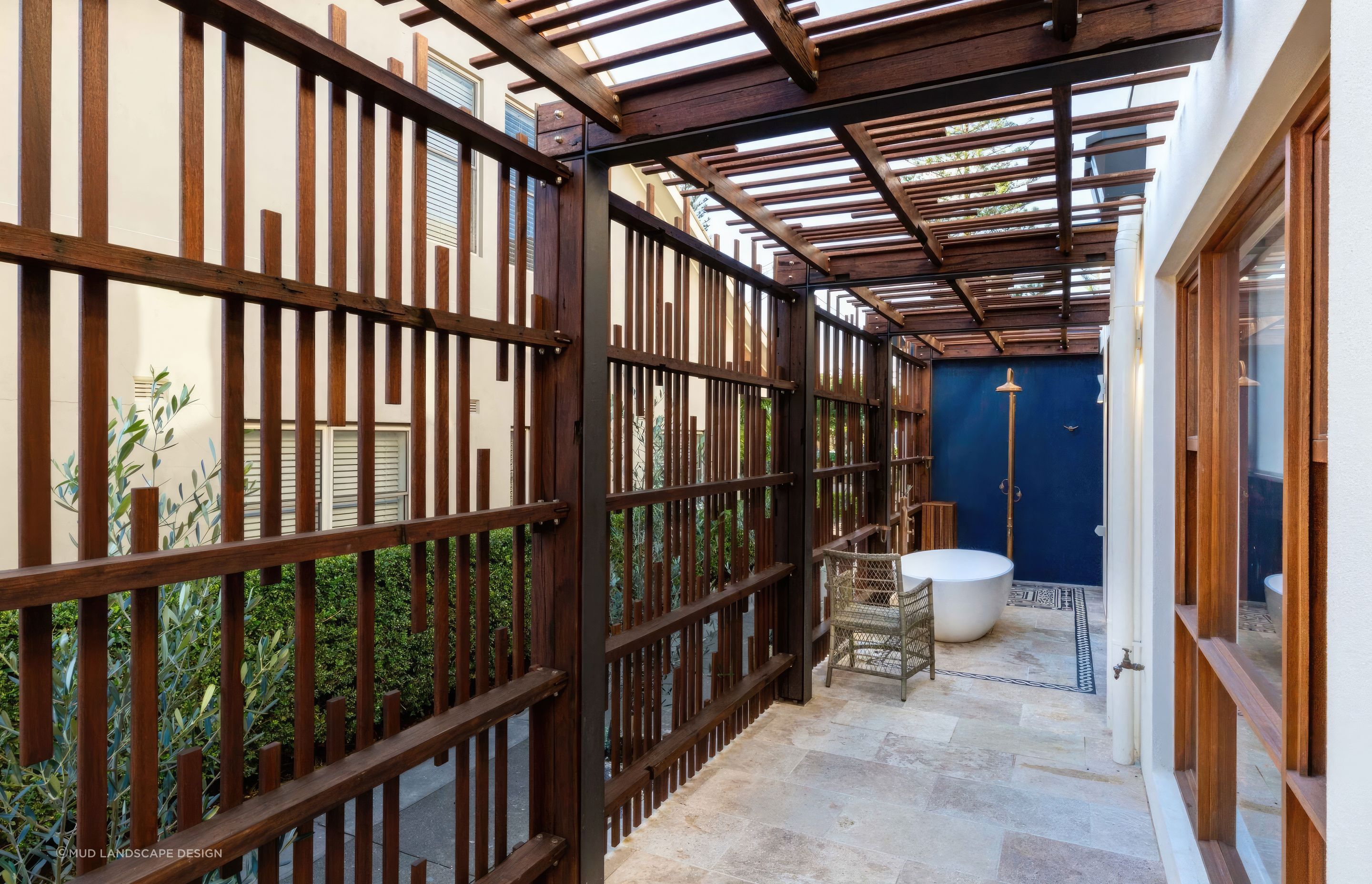 upBar-Beach-Urban-Oasis-Screened-outdoor-shower-area-and-bath-scaled-fix-standard-scale-200x.jpg