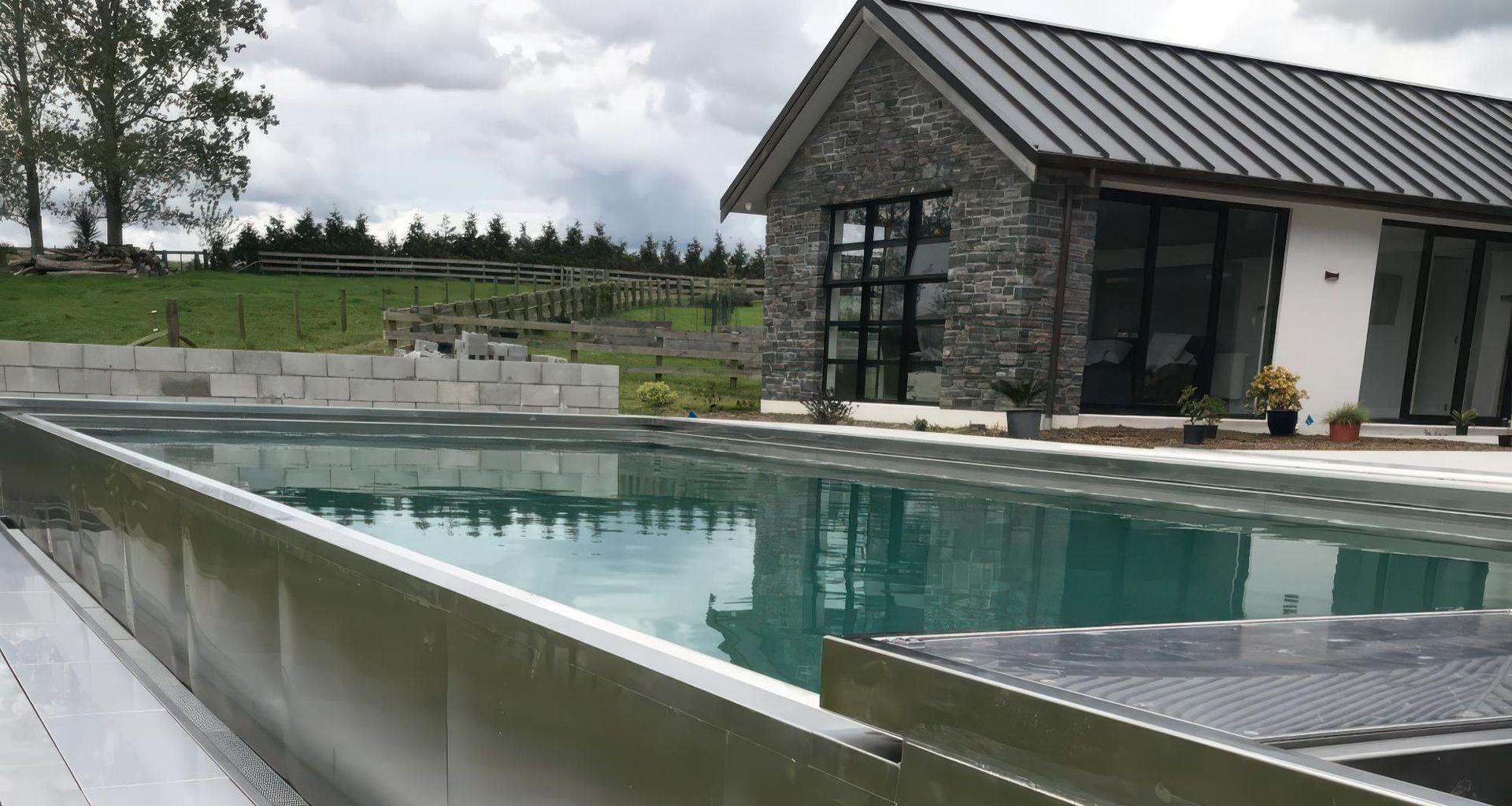Stainless steel, over concrete - Karaka Lux banner