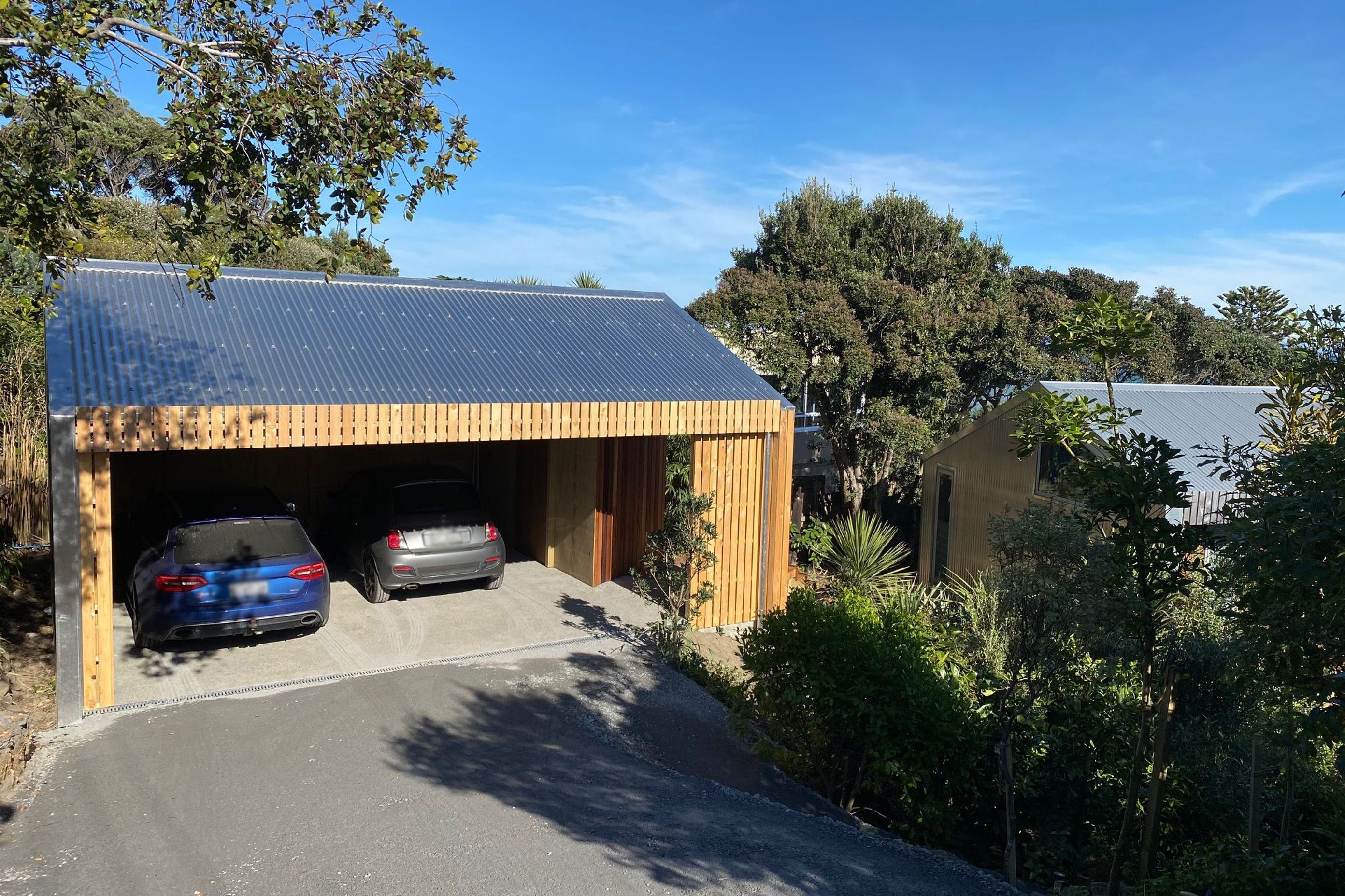 A carport was added as part of the renovation works. A small studio space is also to be added on the other side of the driveway.