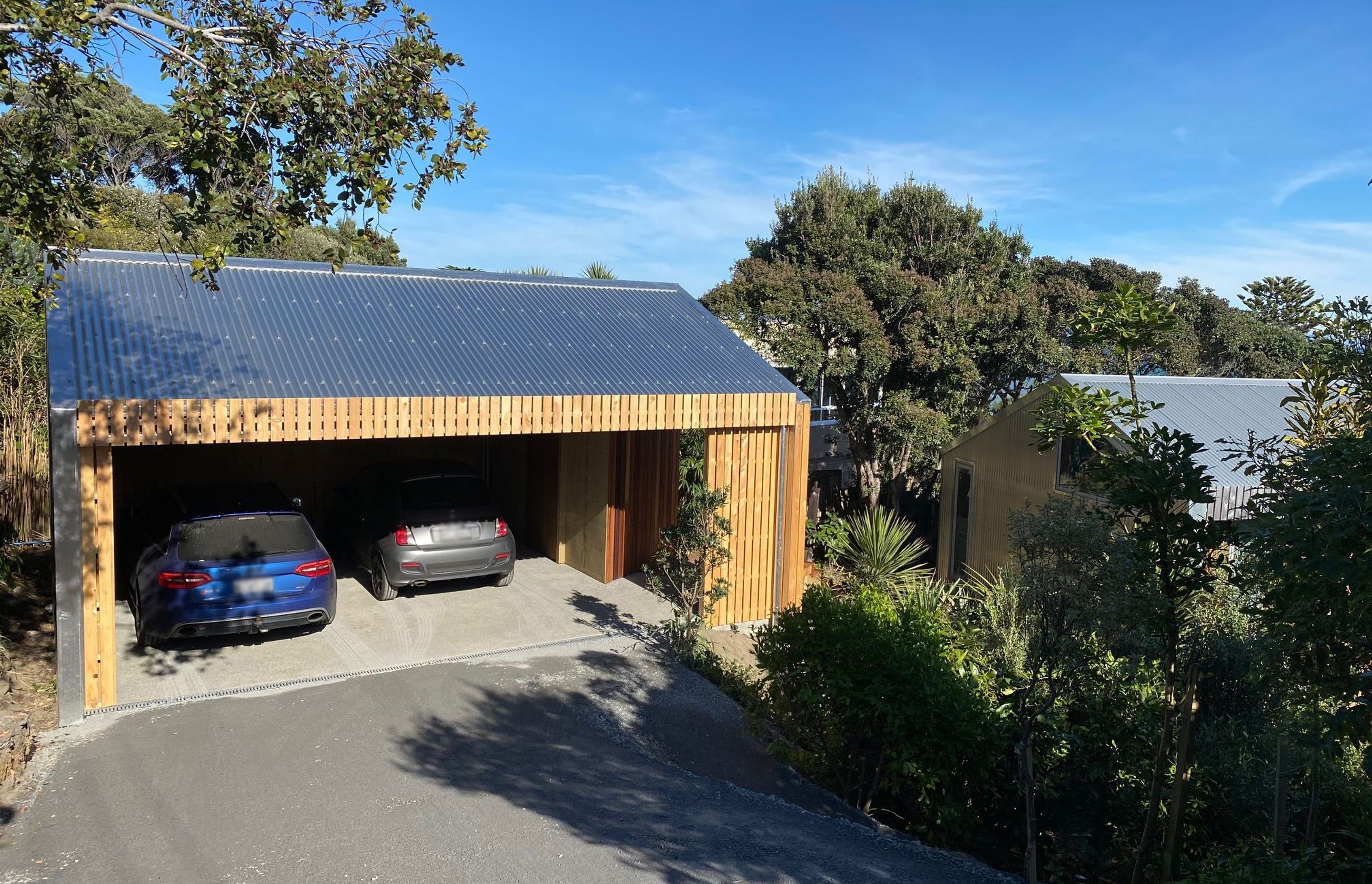 A carport was added as part of the renovation works. A small studio space is also to be added on the other side of the driveway.