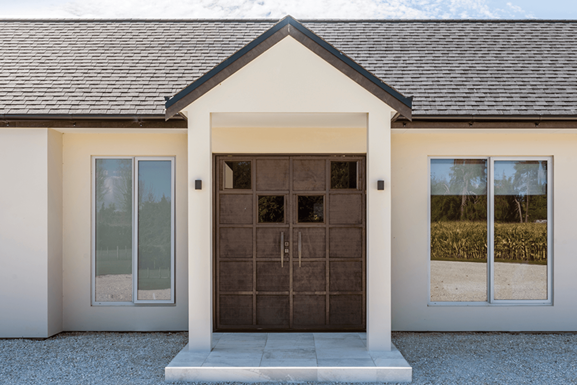 The front door hints at the symmetry that the client was keen to emulate.