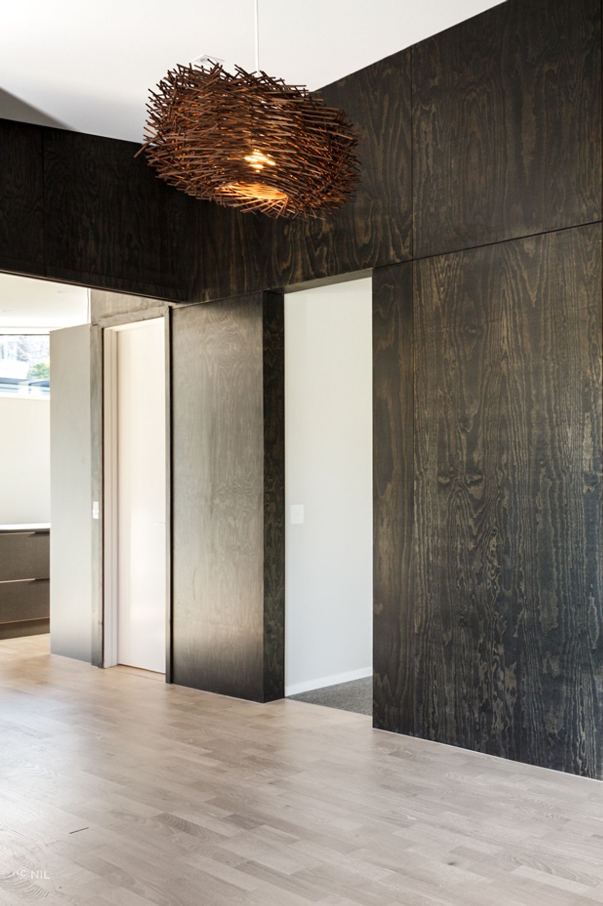 plywood-black-feature-wall-tv-room-1.jpg