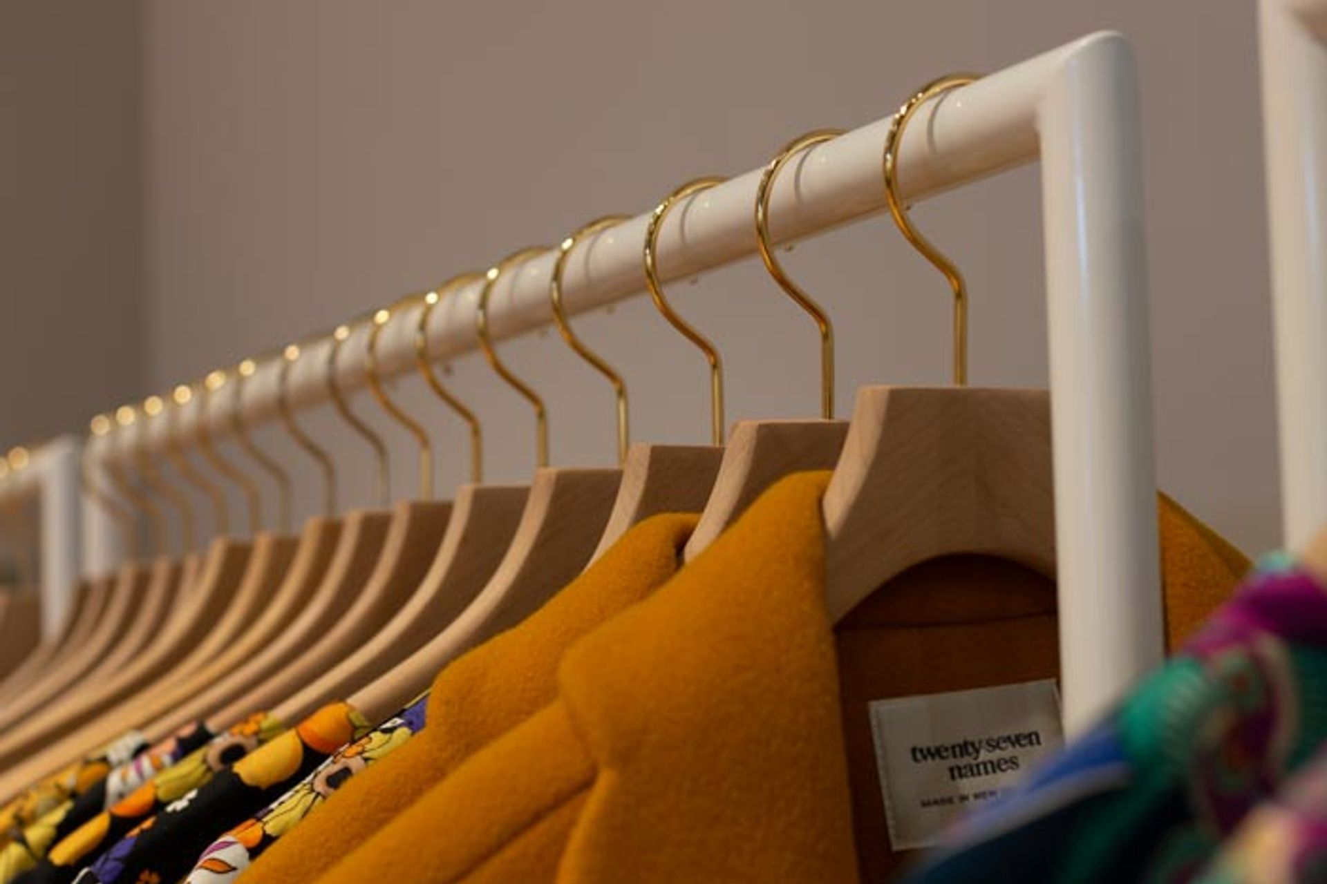 twenty-seven names - retail clothing racks