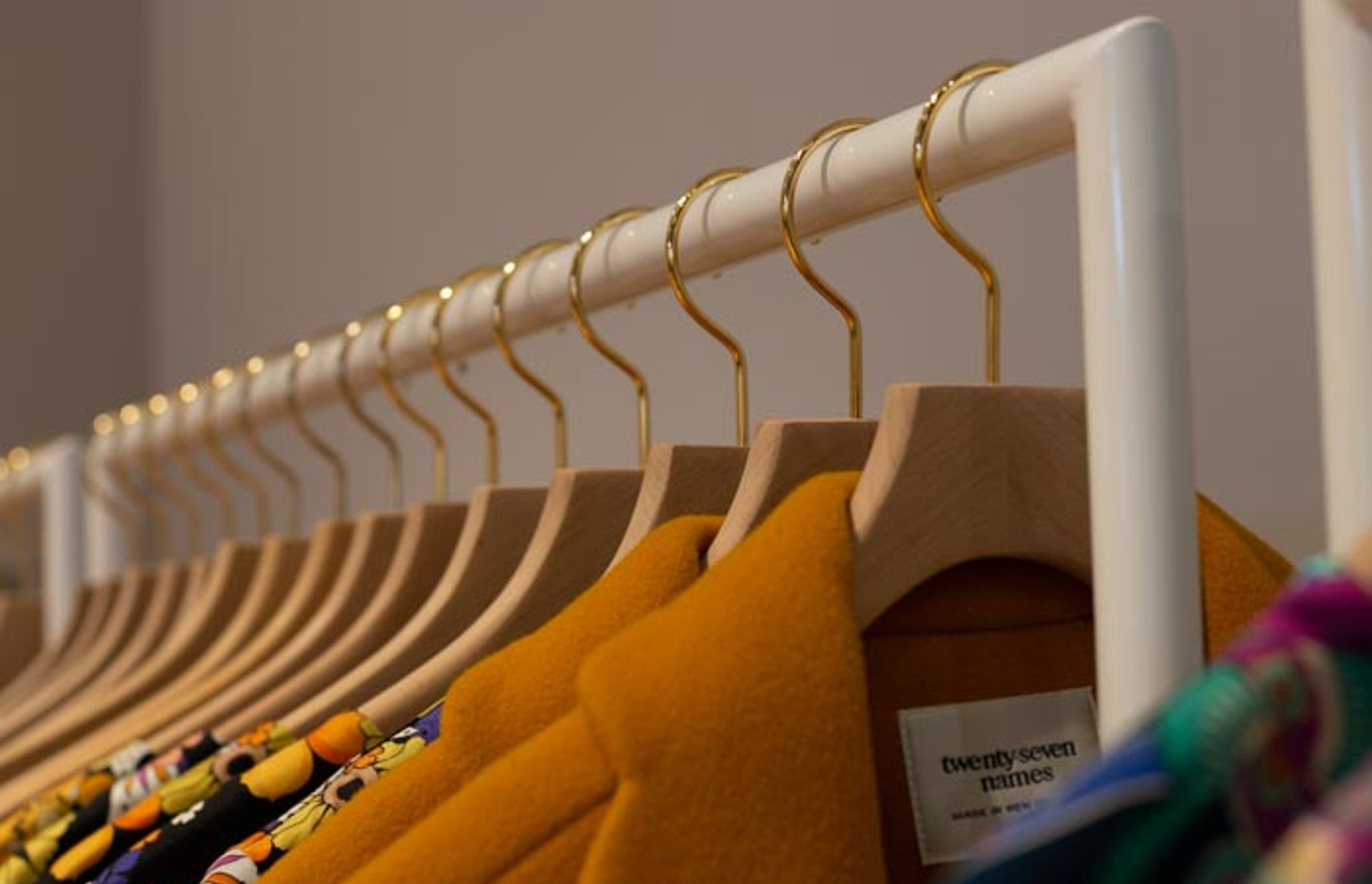 twenty-seven names - retail clothing racks
