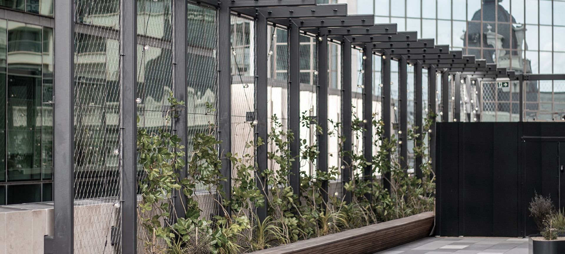 PWC Skydeck - tensile mesh foliage screen banner