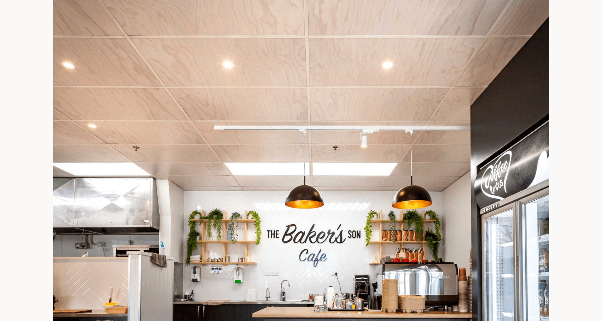 Hygienic ceiling tiles printed with a timber pattern banner