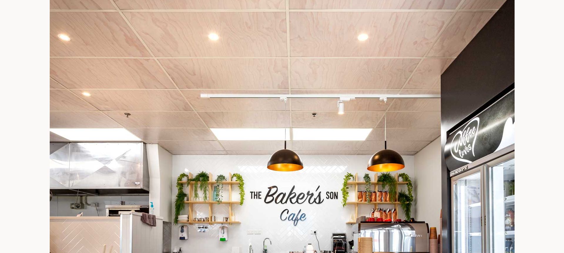Hygienic ceiling tiles printed with a timber pattern banner