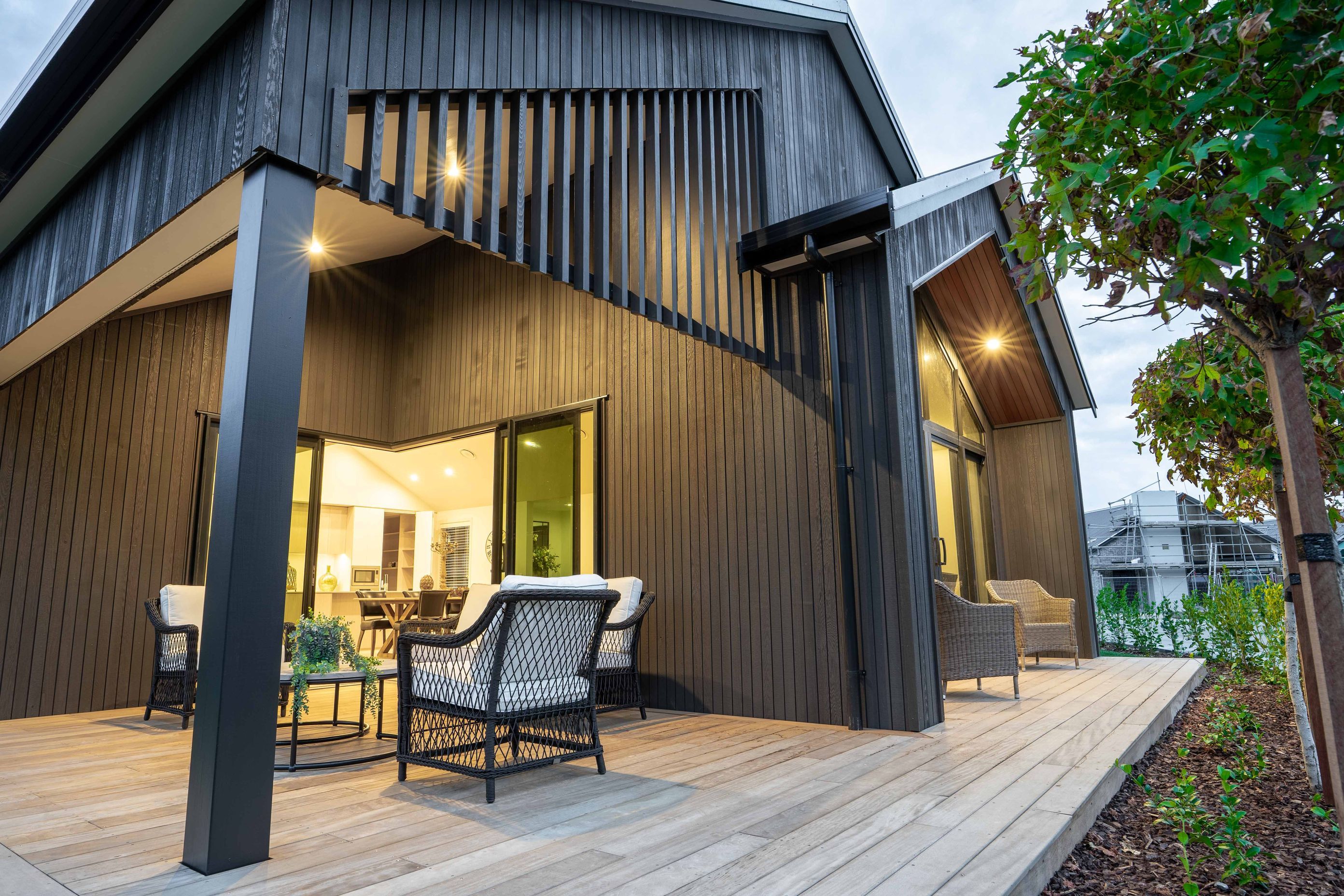 Cedar battens on the eastern patios simultaneously provide shelter and style.