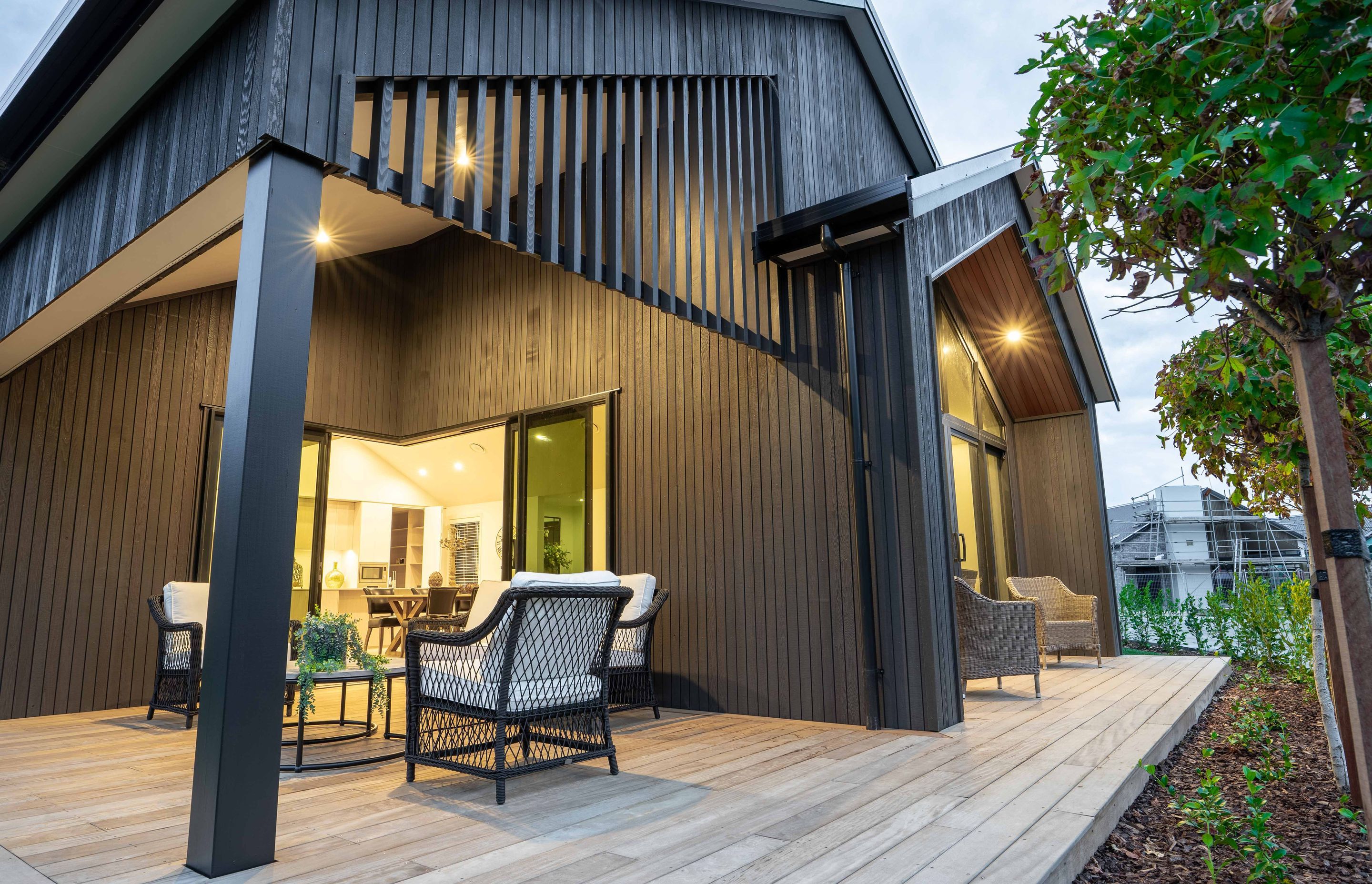 Cedar battens on the eastern patios simultaneously provide shelter and style.