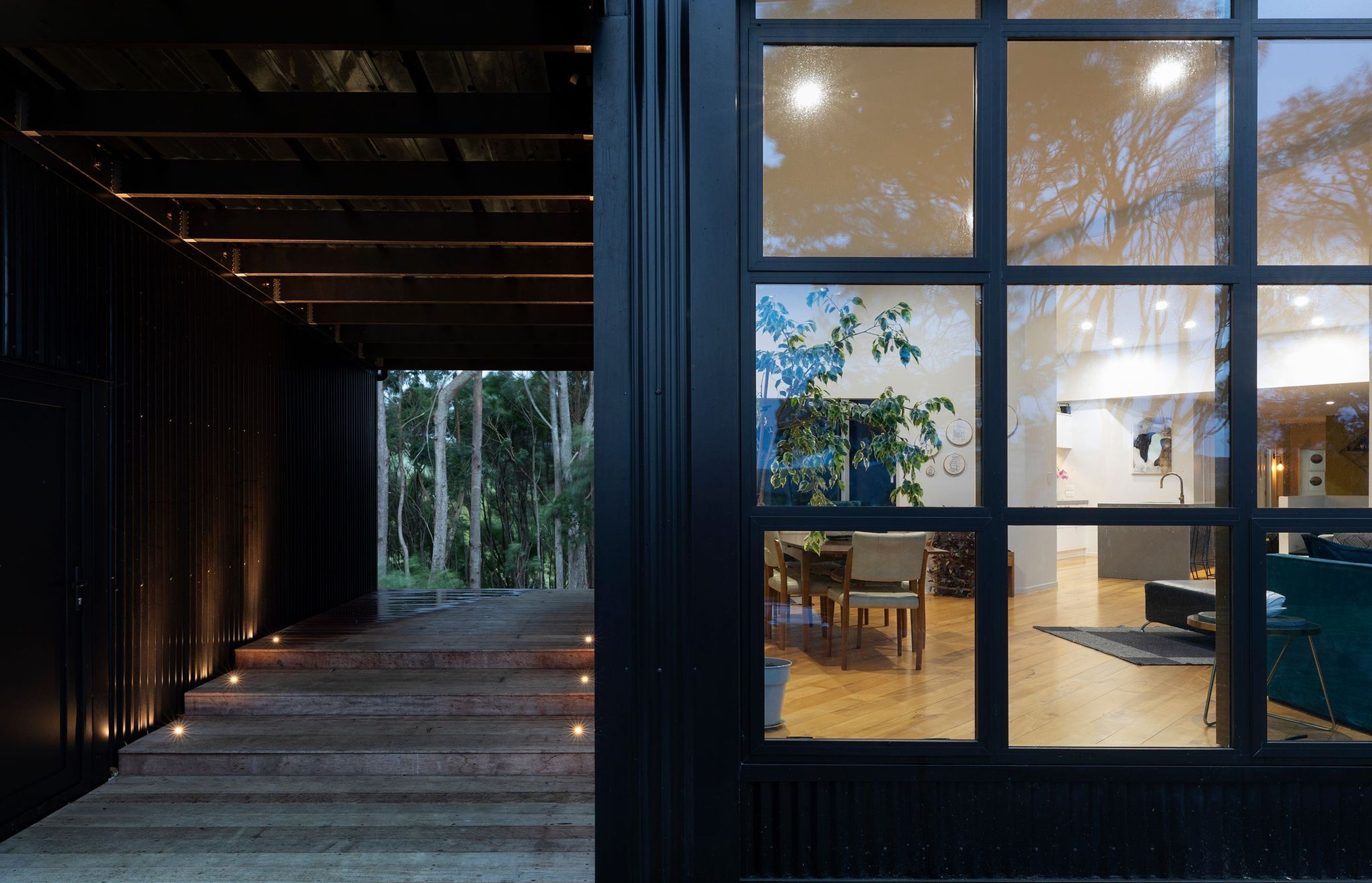 The breezeway sets up a less formal entrance to the home and also serves to frame a stand of eucalypts, for which the house is named. It also serves to separate the garaging and self-contained guest wing from the core family area of the home.