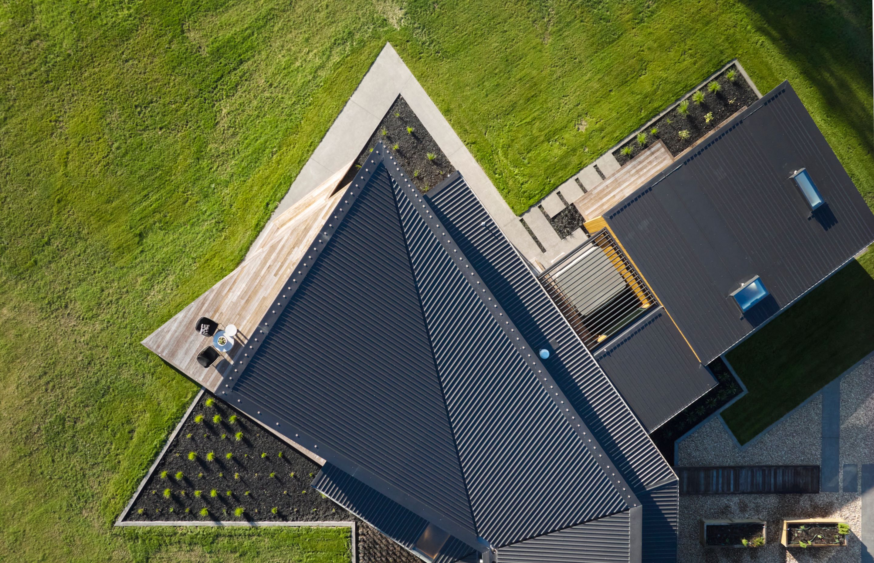 The angular form of the building is evident from above.