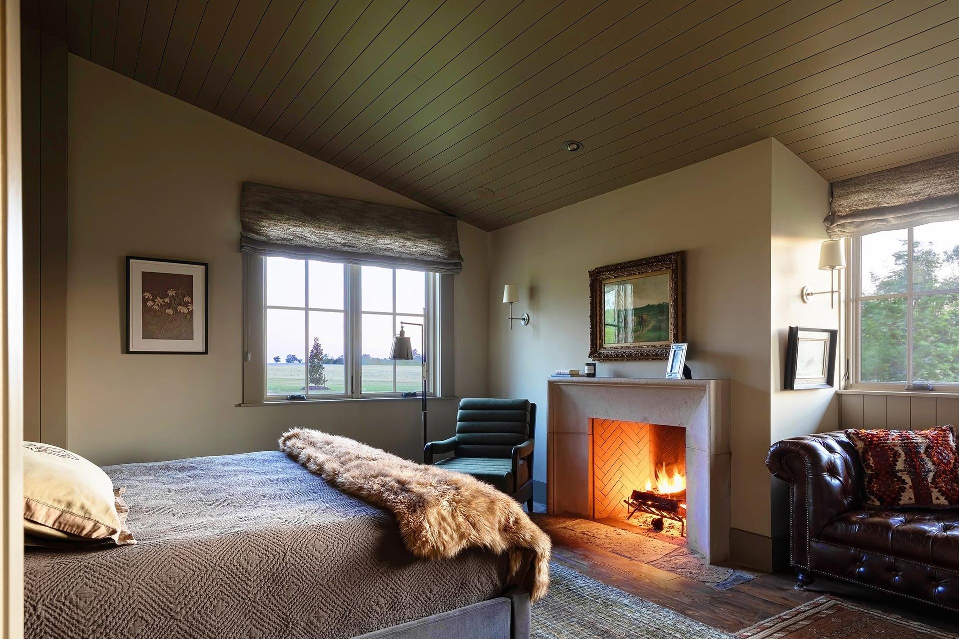 10HomeontheRangeCuppettKilpatrickArchitectureandInteriorDesignwood-ceiling-leather-armchair-bedroom.jpg