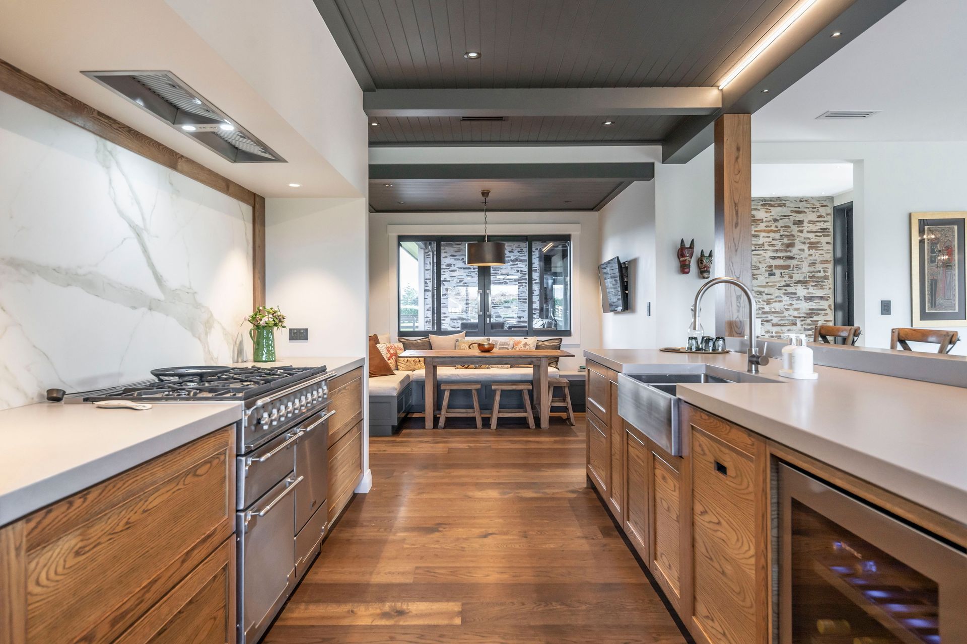 Adjacent to the kitchen is a dining nook, one of the must-have elements the homeowners wanted incorporated into the design.