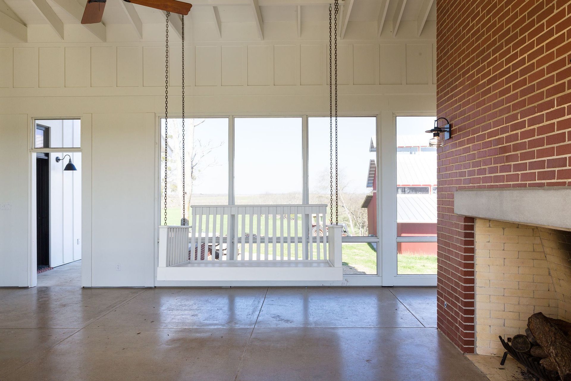 12PendletonFarmCuppettKilpatrickArchitectureandInteriorDesignaustin-tx-modern-farmhouse-screened-porch-swing.jpg