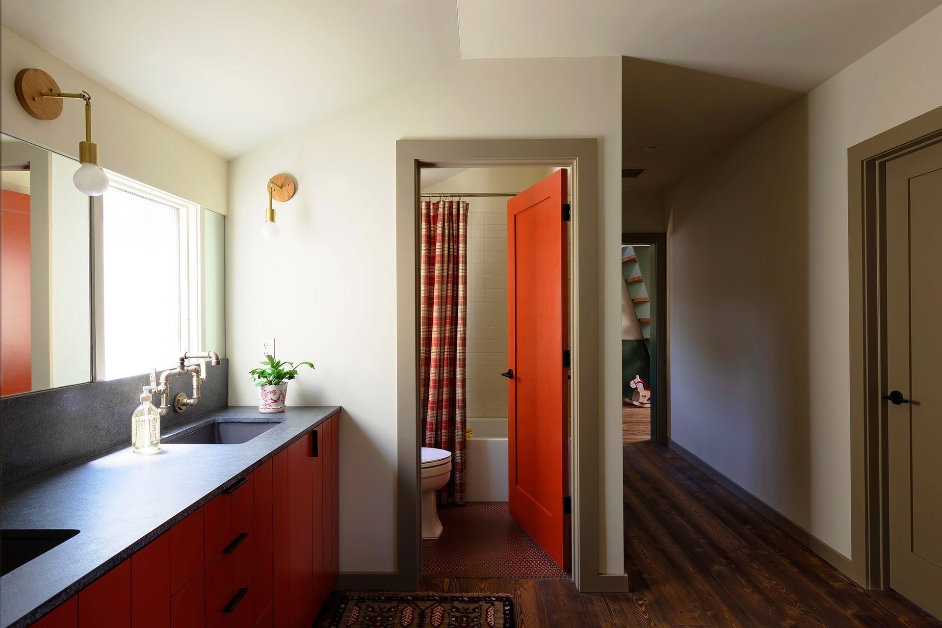 13HomeontheRangeCuppettKilpatrickArchitectureandInteriorDesignred-cabinetry-dark-countertop-bathroom.jpg