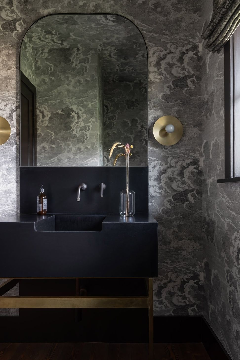 14Home-on-the-RangeCuppett-Kilpatrick-Architecture-and-Interior-Designcloud-wallpaper-black-vanity-brass-accents.jpg