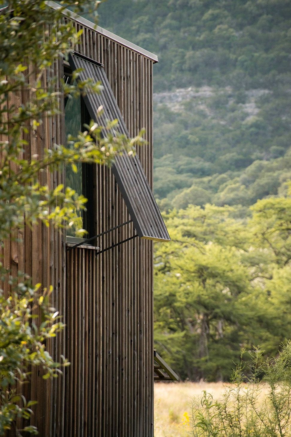 25CampFrioCuppettKilpatrickArchitectureandInteriorDesigncabin-awning-hillside-architecture.jpg