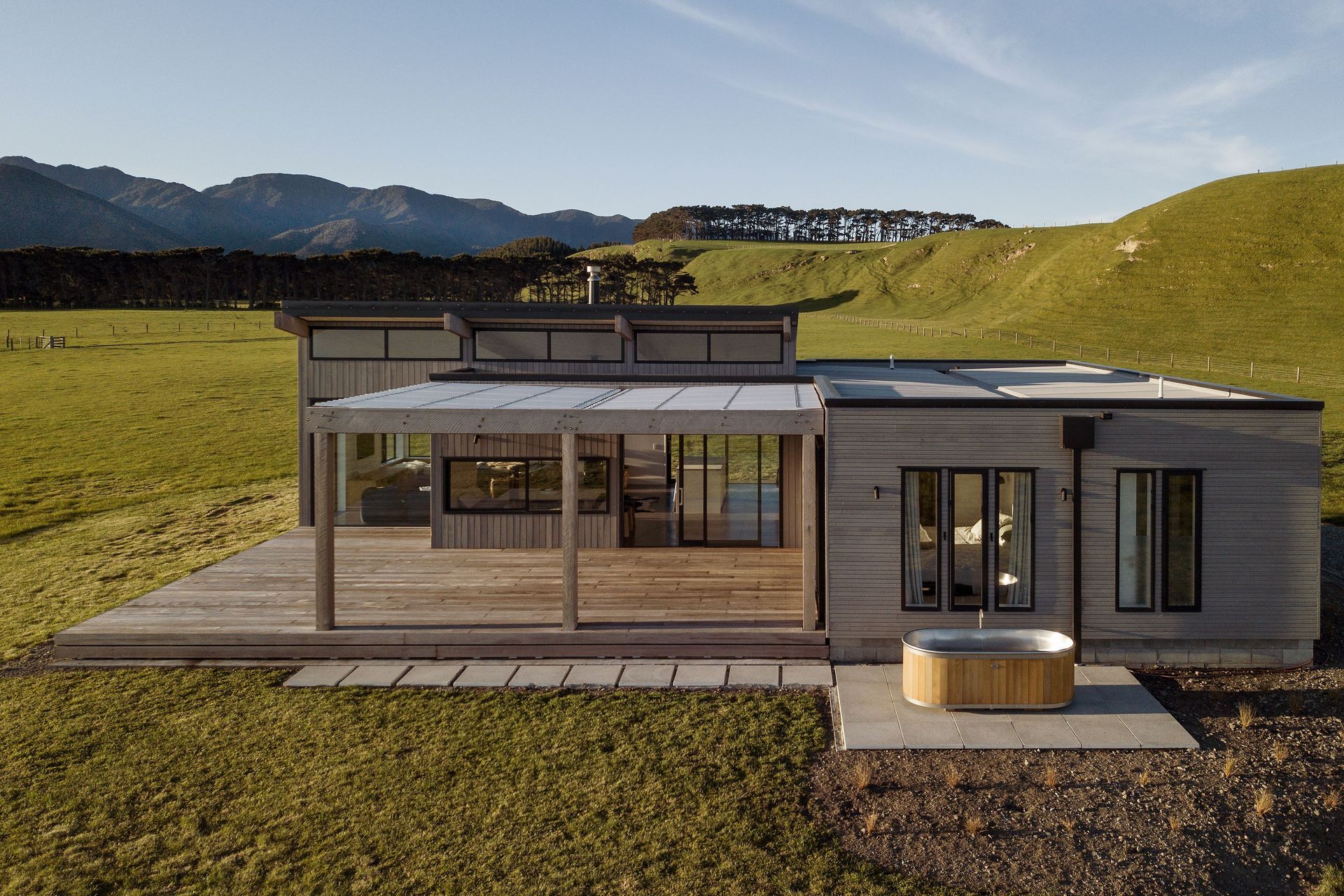 As per the owners' wishes, the variety of timber sizes used on the cladding does indeed give the impression that the building has evolved over time—as materials became available—rather than being built in one piece, making it subtle in its design.