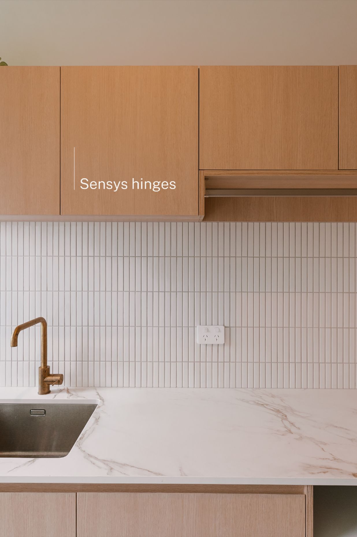 See the attention to detail with the alignment of the tiles and overhead cabinets. Once you have Sensys hinges you won't be able to live without them.