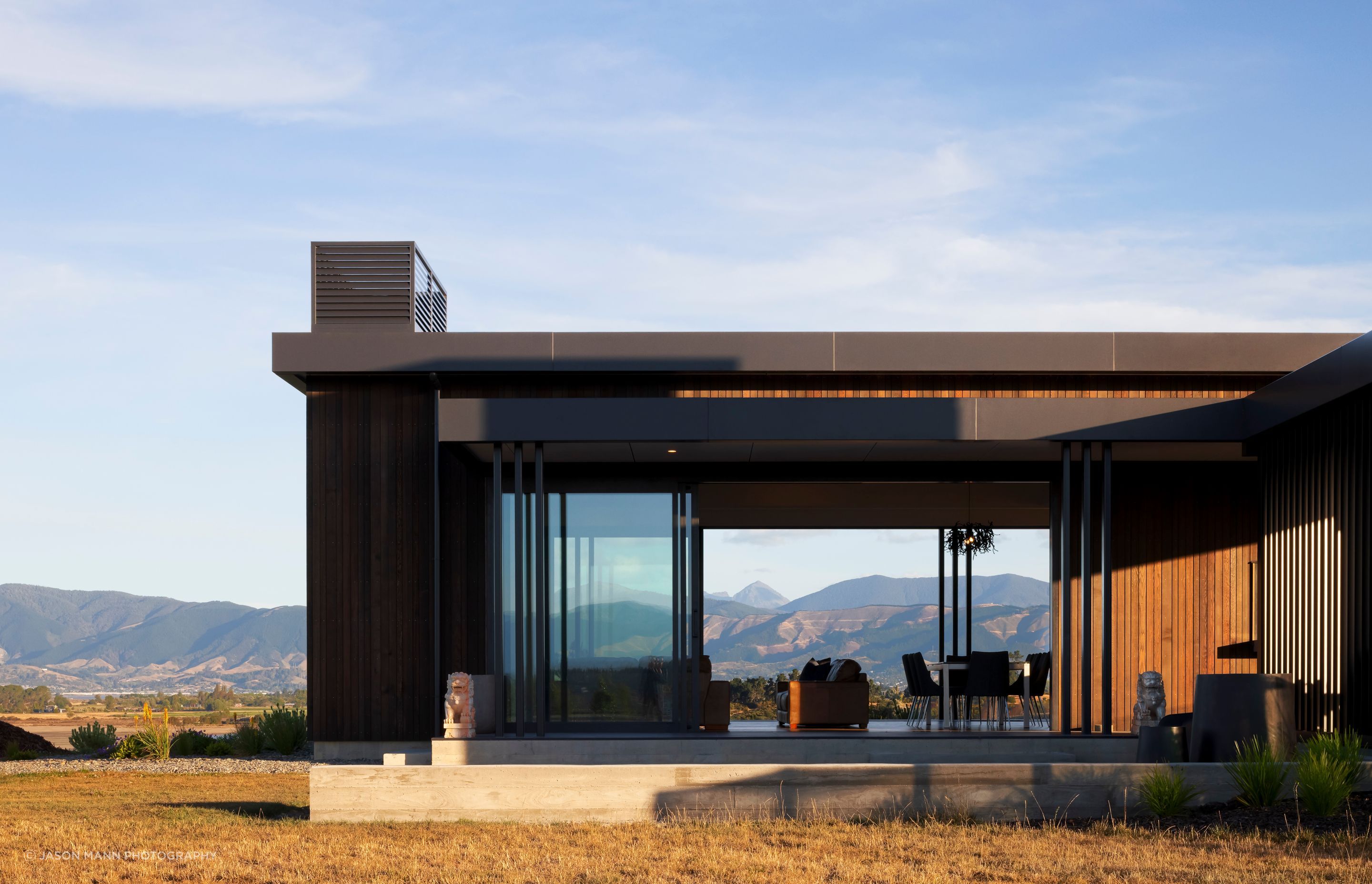 Overlooking Waimea Inlet, the Hoddy Road house enjoys all day sun and panormaic views.