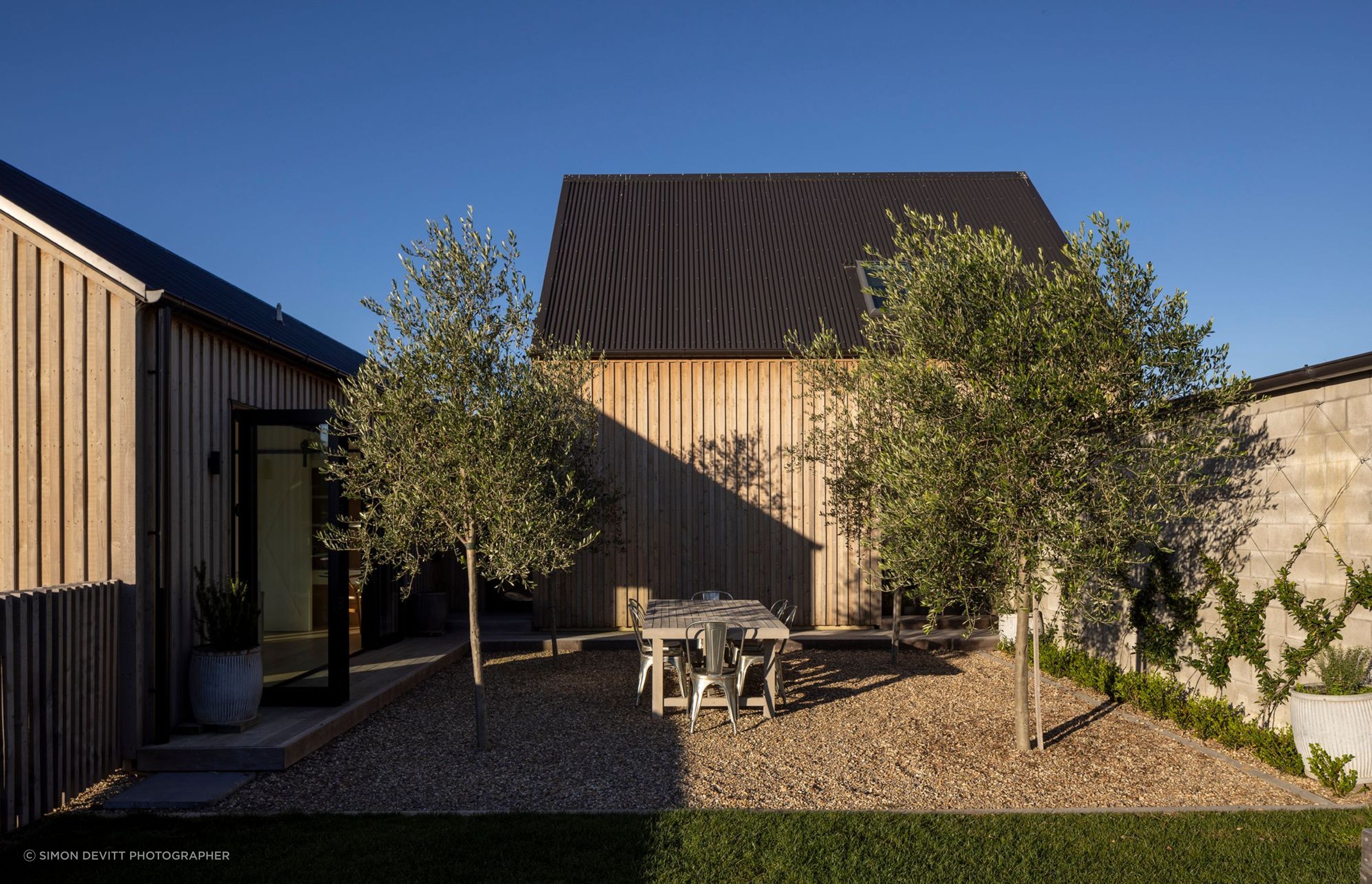 The courtyard to the rear of the house provides a safe, enclosed environment for young children.