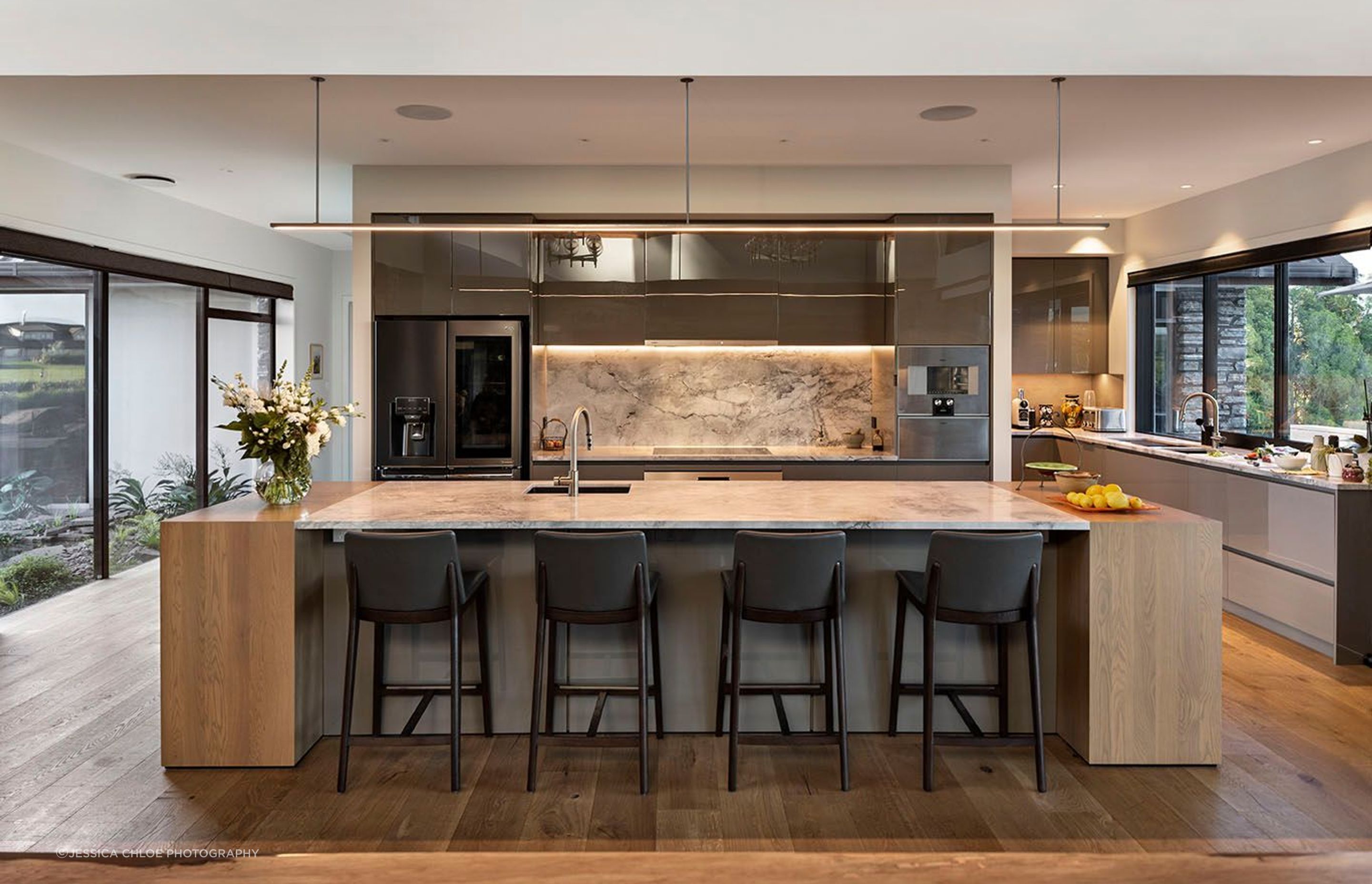 Open kitchen offers social and casual dining in addition to the formal spaces