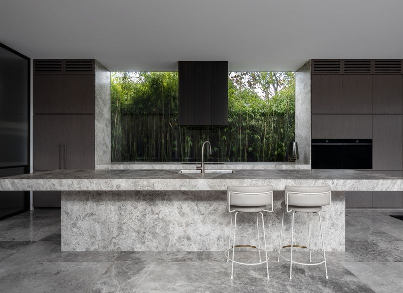 House of Bronzed Steel and Stone