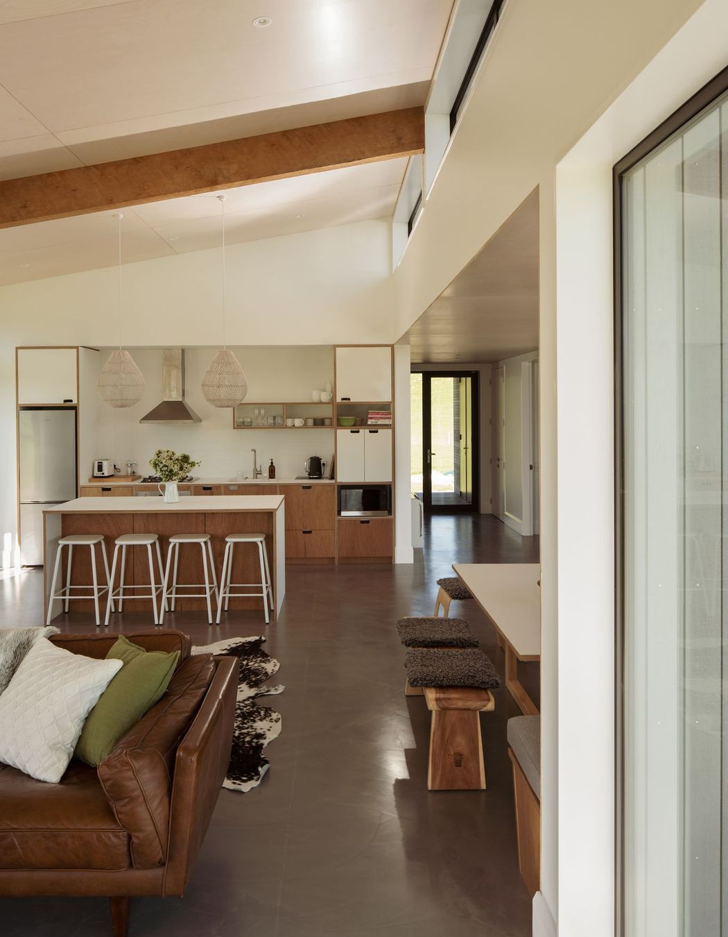 The client's primary residence is a large, two-storey homestead, so for this property they wanted it to be the opposite of that—compact, yet with a feeling of spaciousness when in the rooms, as well as being light and airy inside.