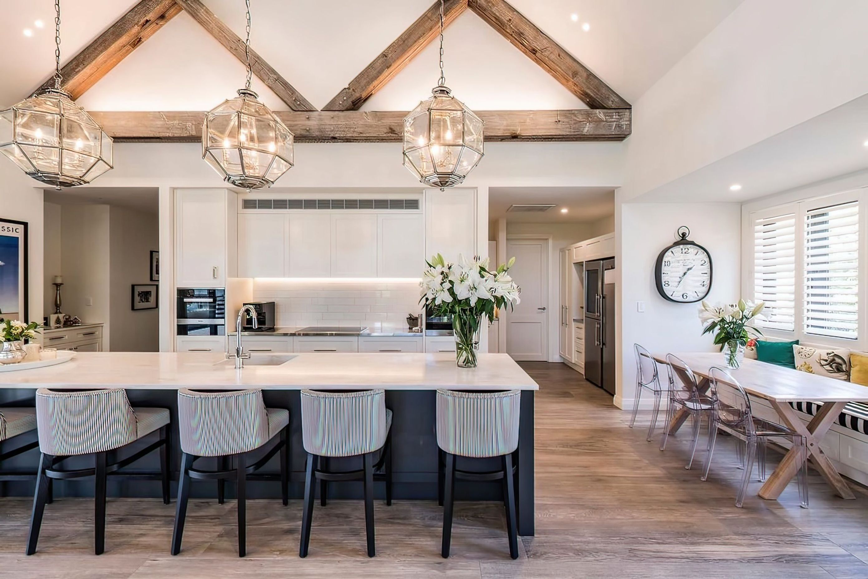 The-kitchen-featuring-exposed-rafters-in-Canadian-Oregon-topaz-very-compressed-2x-v2.jpeg