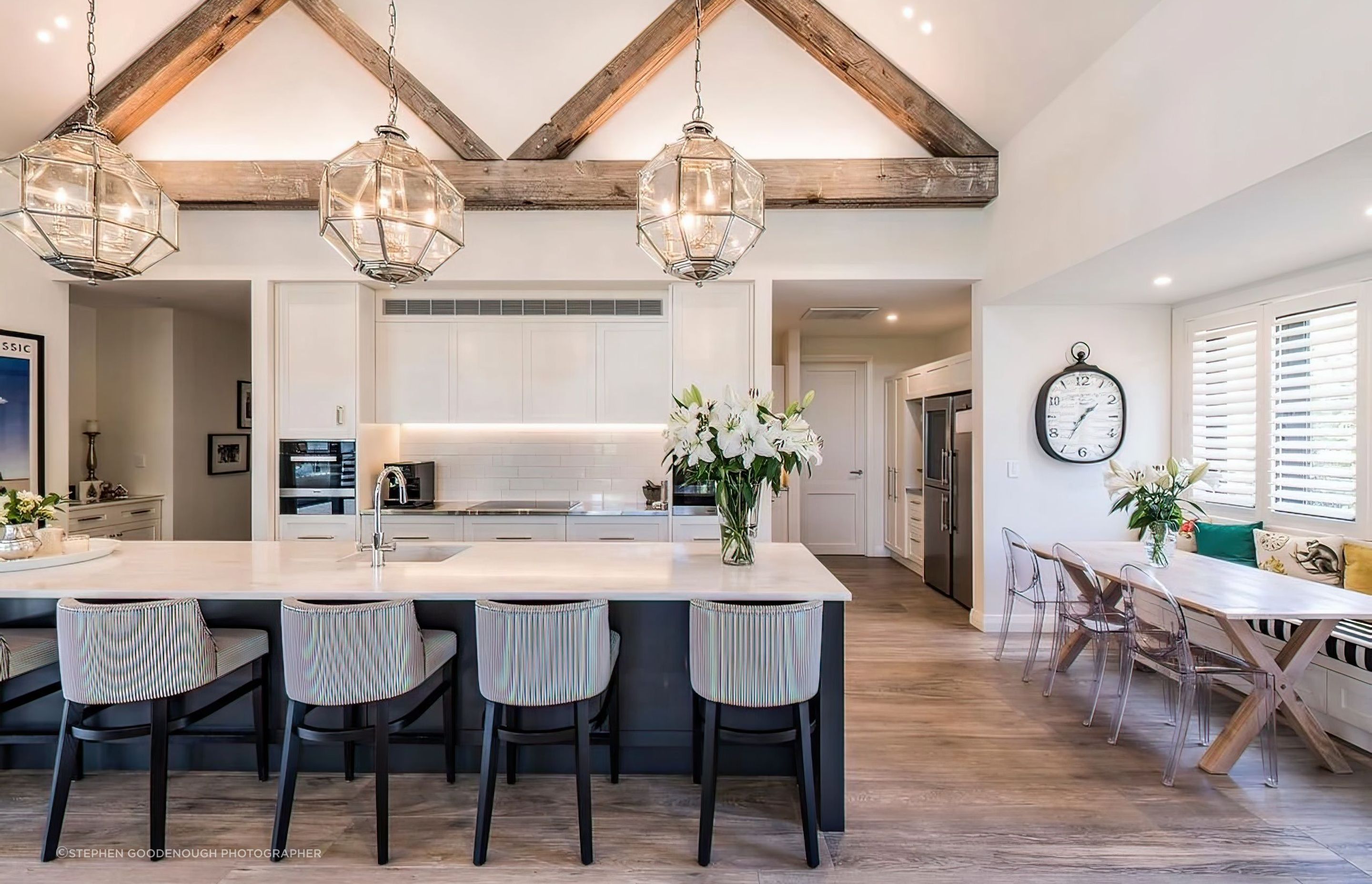 The-kitchen-featuring-exposed-rafters-in-Canadian-Oregon-topaz-very-compressed-2x-v2.jpeg