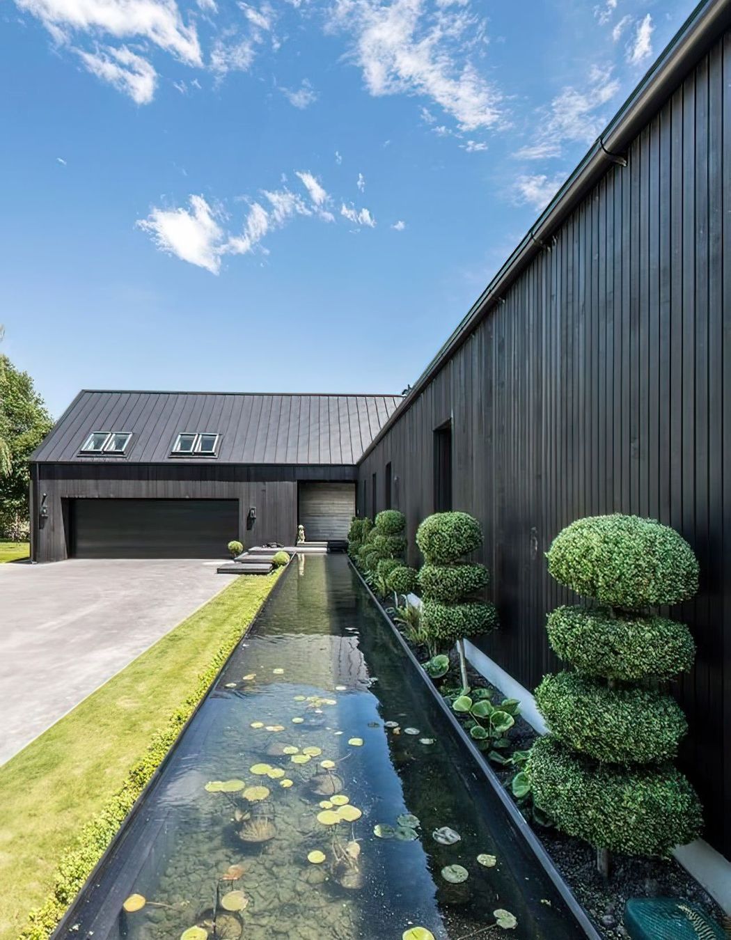 The-pond-and-plant-area-showing-the-weatherboard-and-tray-roofing-topaz-very-compressed-2x-v2.jpeg