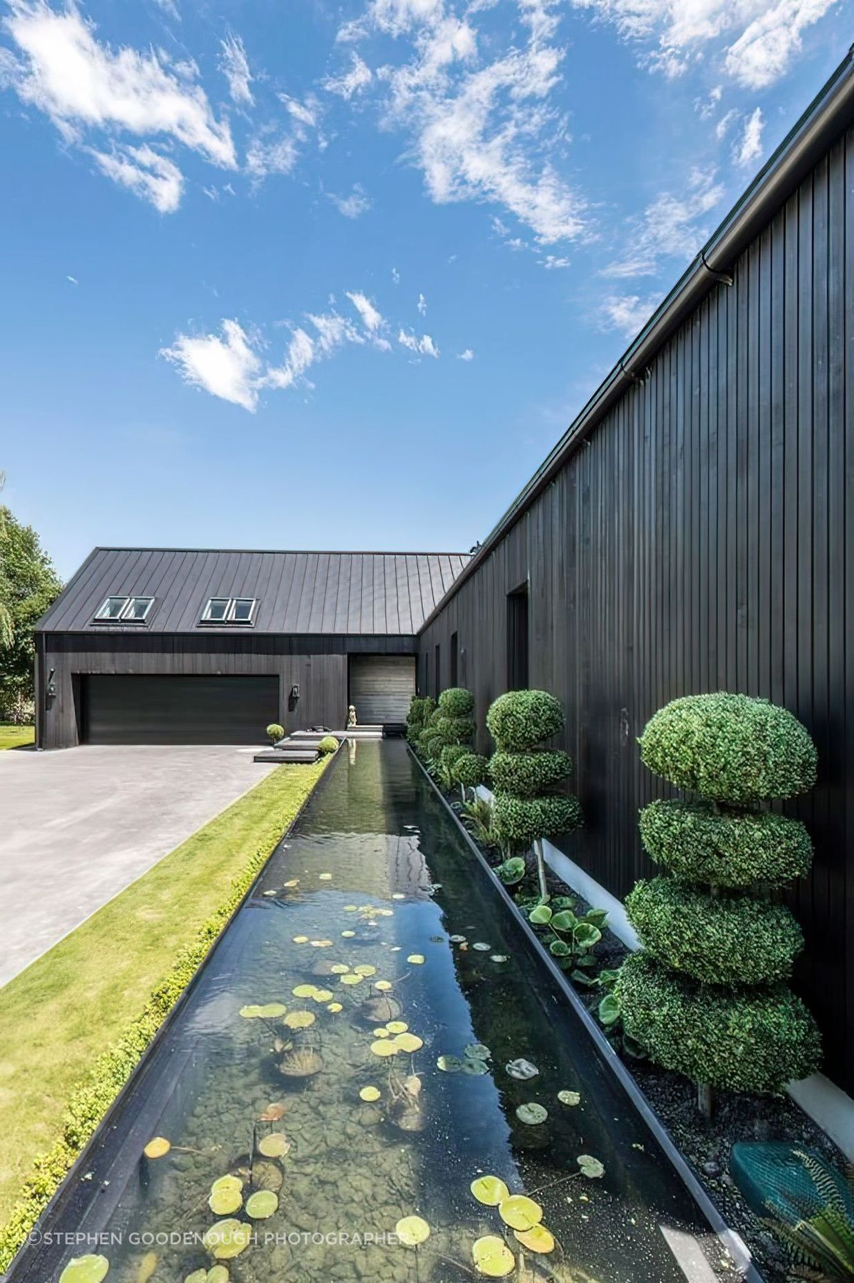 The-pond-and-plant-area-showing-the-weatherboard-and-tray-roofing-topaz-very-compressed-2x-v2.jpeg
