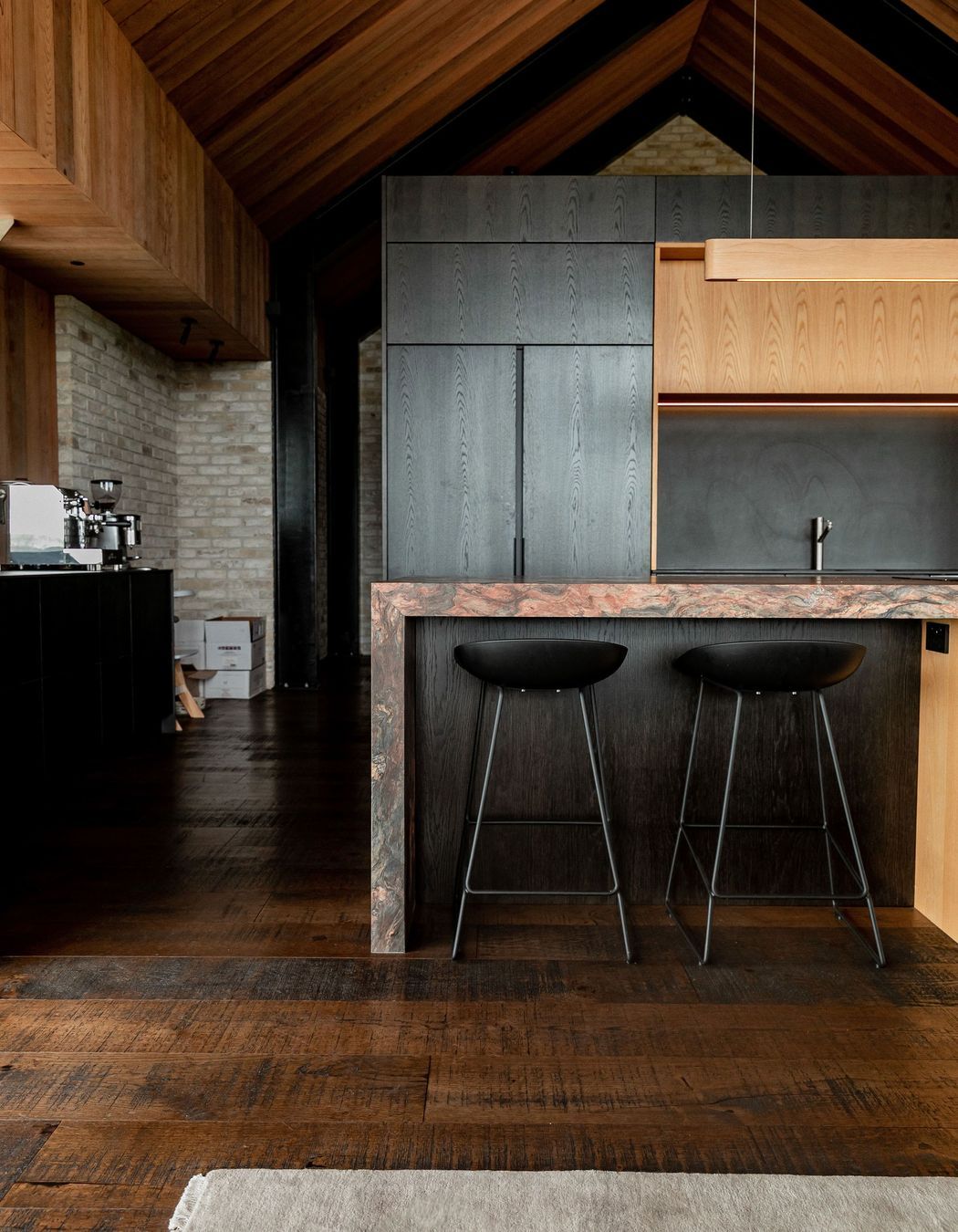 Behind the kitchen, a concealed scullery hides all of the mess, and to the left of the kitchen resides the private master wing.