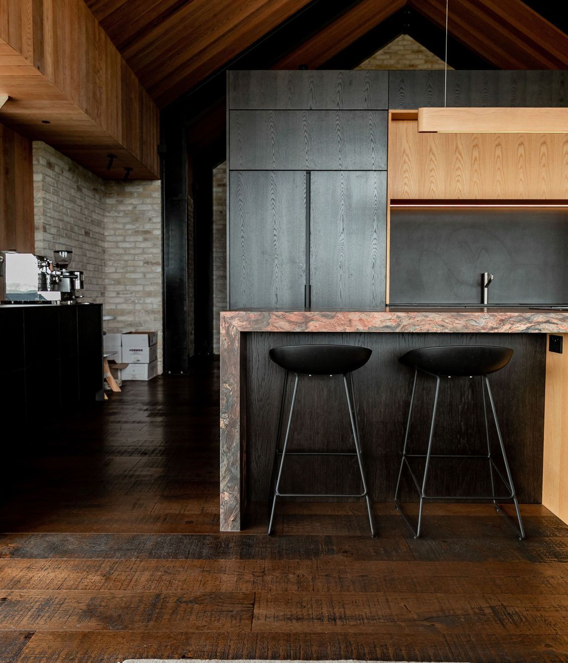 Behind the kitchen, a concealed scullery hides all of the mess, and to the left of the kitchen resides the private master wing.