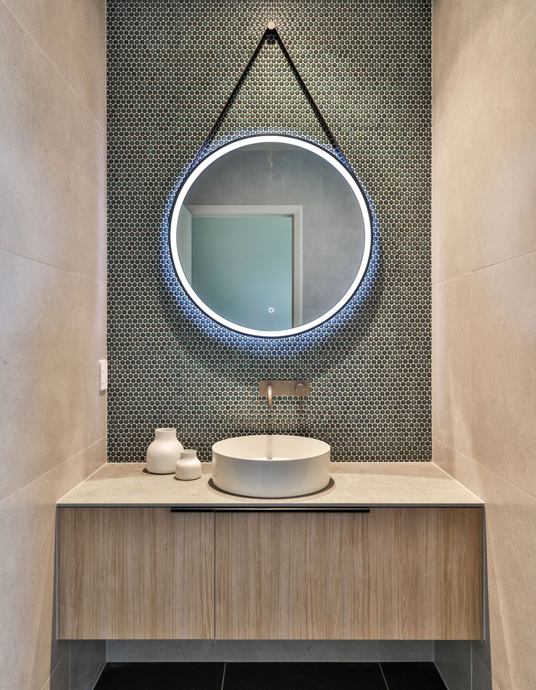 Design by Cube Dentro. Tiles: Cordoba Black 600x600mm on the floor with Cordoba Pearl 600x600mm on the walls. Mosaix Penny Round Jade.