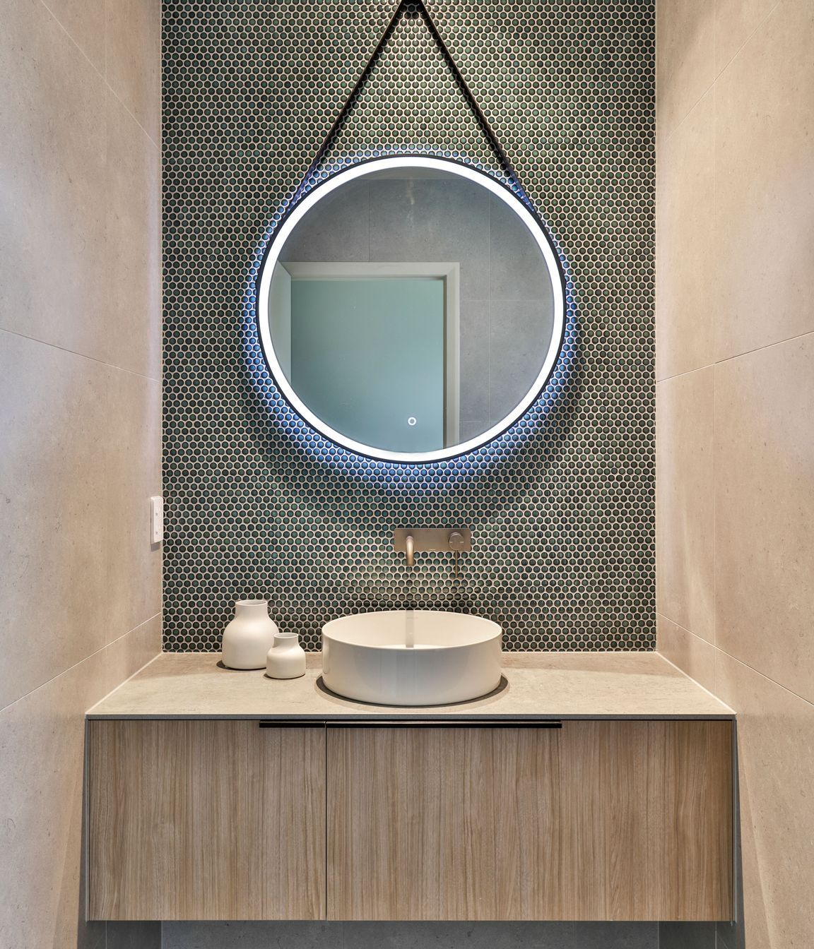 Design by Cube Dentro. Tiles: Cordoba Black 600x600mm on the floor with Cordoba Pearl 600x600mm on the walls. Mosaix Penny Round Jade.
