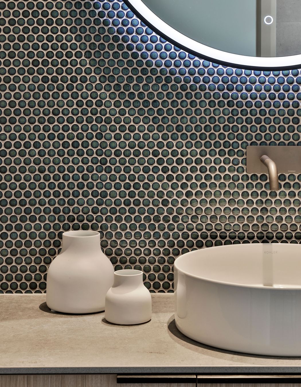 Design by Cube Dentro. Tiles: Mosaix Penny Round Jade.